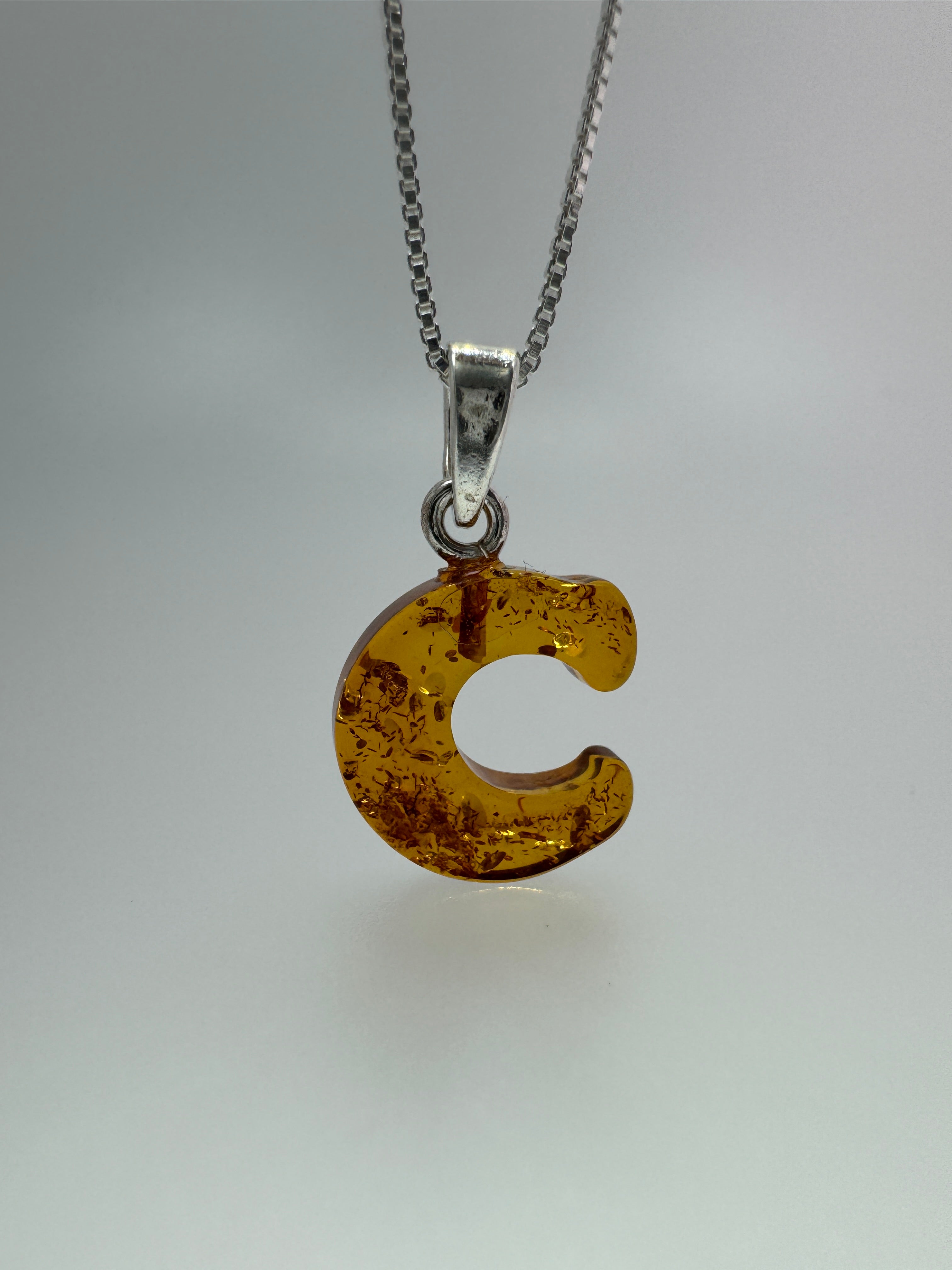 Personalized Baltic Amber Initial Pendant – Handcarved from one stone - shipped on choice of silver chain.