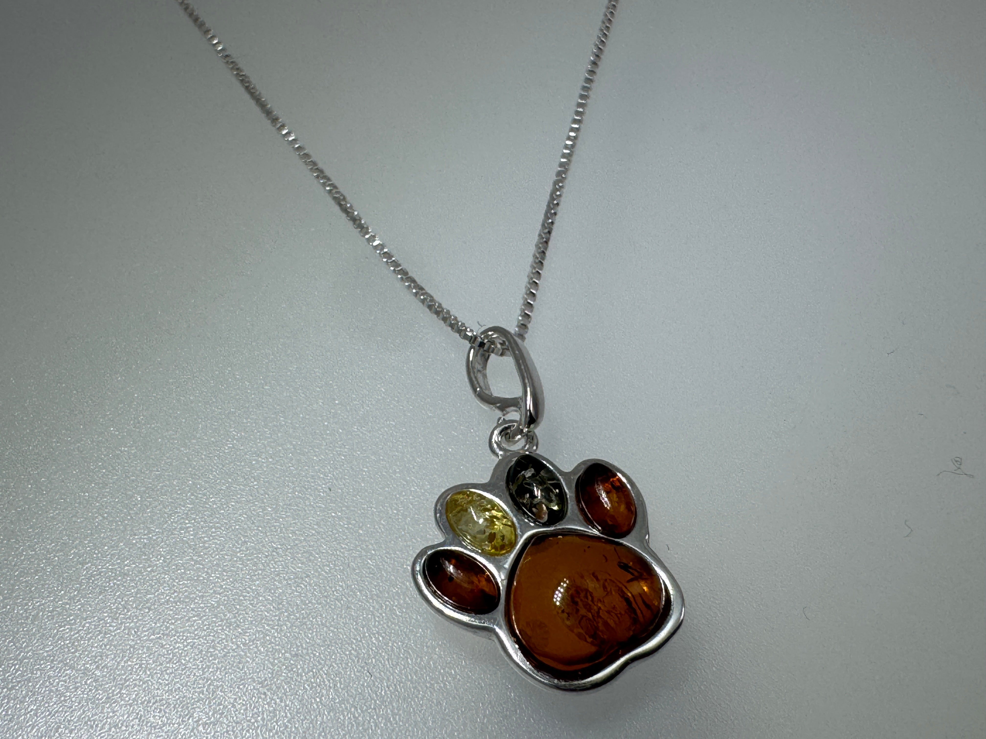 Sterling Silver Baltic Amber Dog Paw Pendant – Handmade in Poland with Honey, Lemon & Green Amber – Pet Lover Necklace