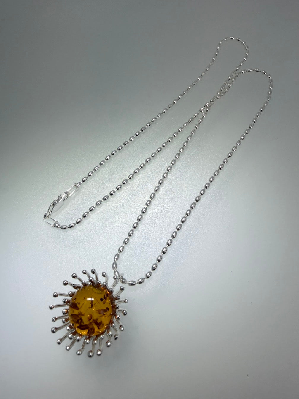 Sterling Silver Cognac Baltic Amber Pendant Necklace – Modern Whimsical Design on Bead Chain – Unique Silver Pin Setting