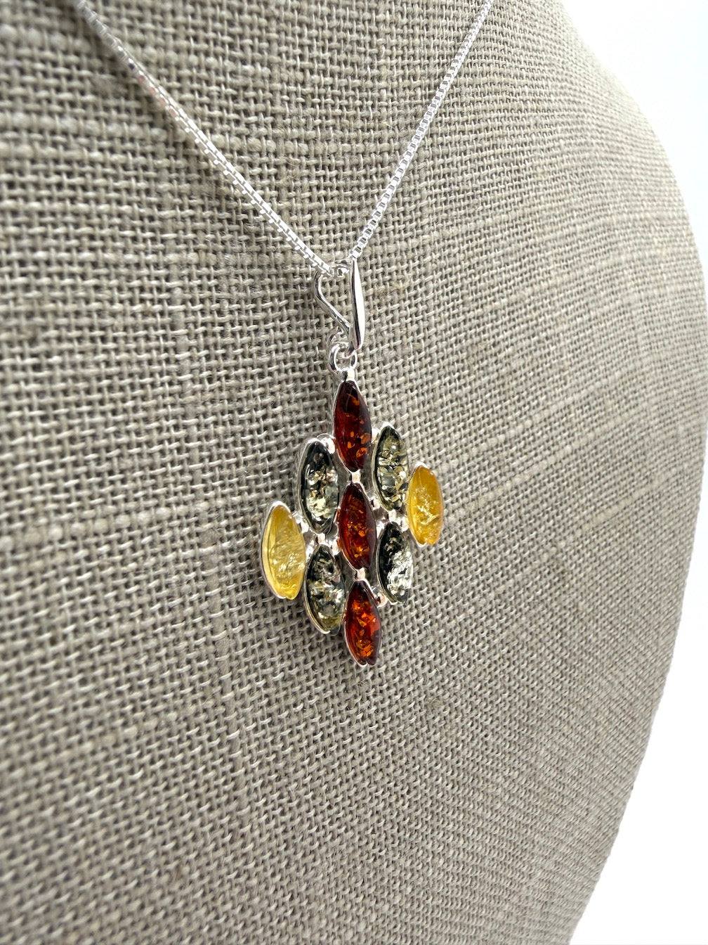 SEO Title:
Sterling Silver Multistone Baltic Amber Drop Pendant – Handmade in Poland – Marquise Amber Necklace