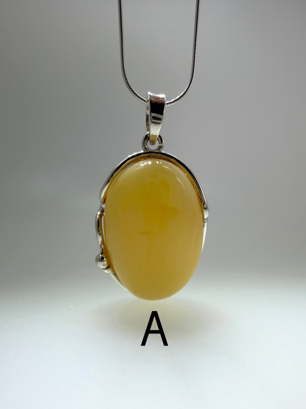 Sterling Silver Organic Pendant with Rare Butterscotch Baltic Amber – Modern Statement Necklace