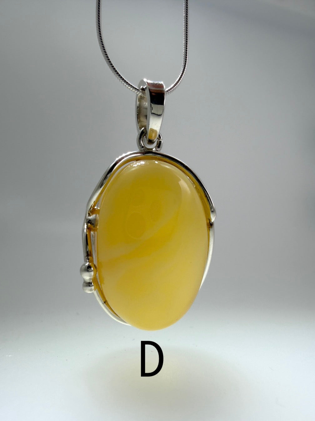 Sterling Silver Organic Pendant with Rare Butterscotch Baltic Amber – Modern Statement Necklace