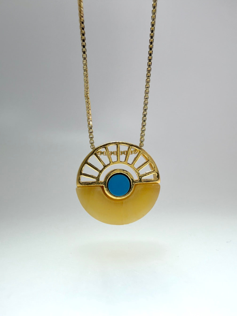 A Timeless Fusion of Cultures and Nature - Baltic amber and Turquoise Pendant on silver chain