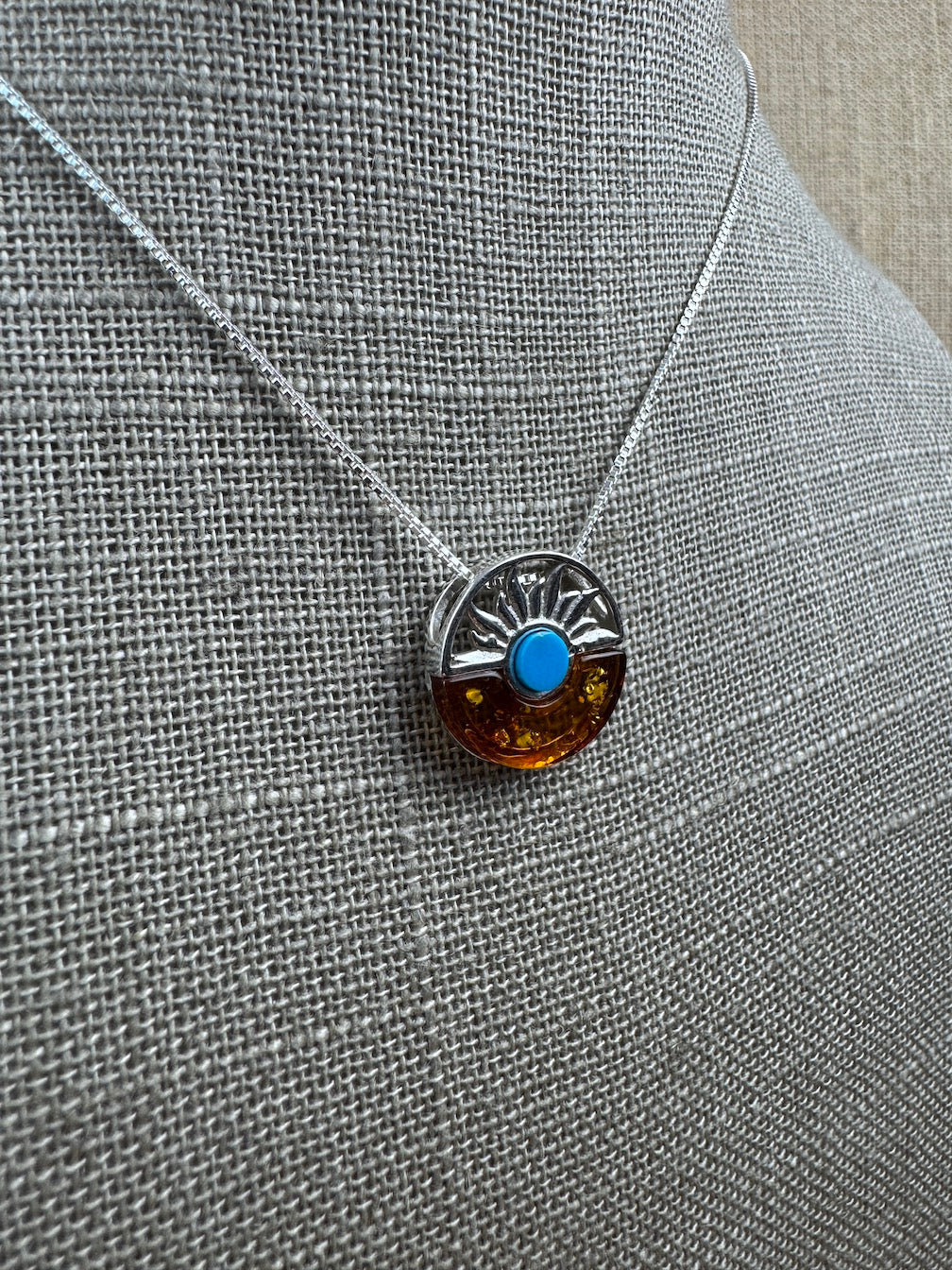 A Timeless Fusion of Cultures and Nature - Baltic amber and Turquoise Pendant on silver chain