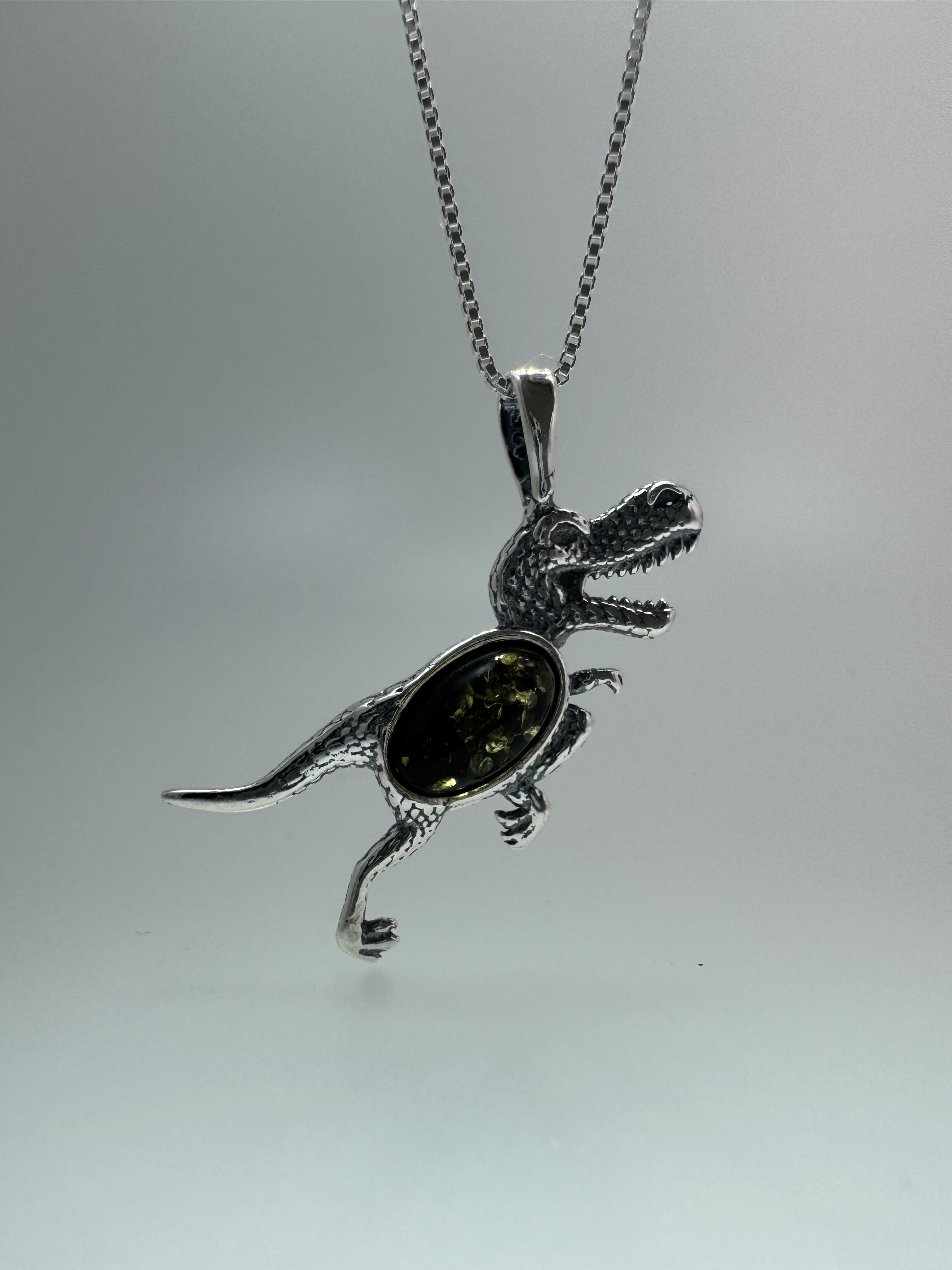 Tiny T-Rex Terror! Baltic Amber Dino Pendant - Shipped on Silver chain or leather