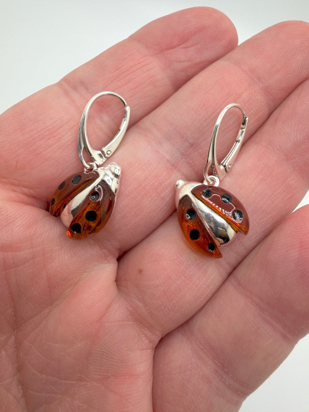 Baltic Amber Ladybug Earrings – Sterling Silver Drop Lever Back – Hand Carved Cognac Amber