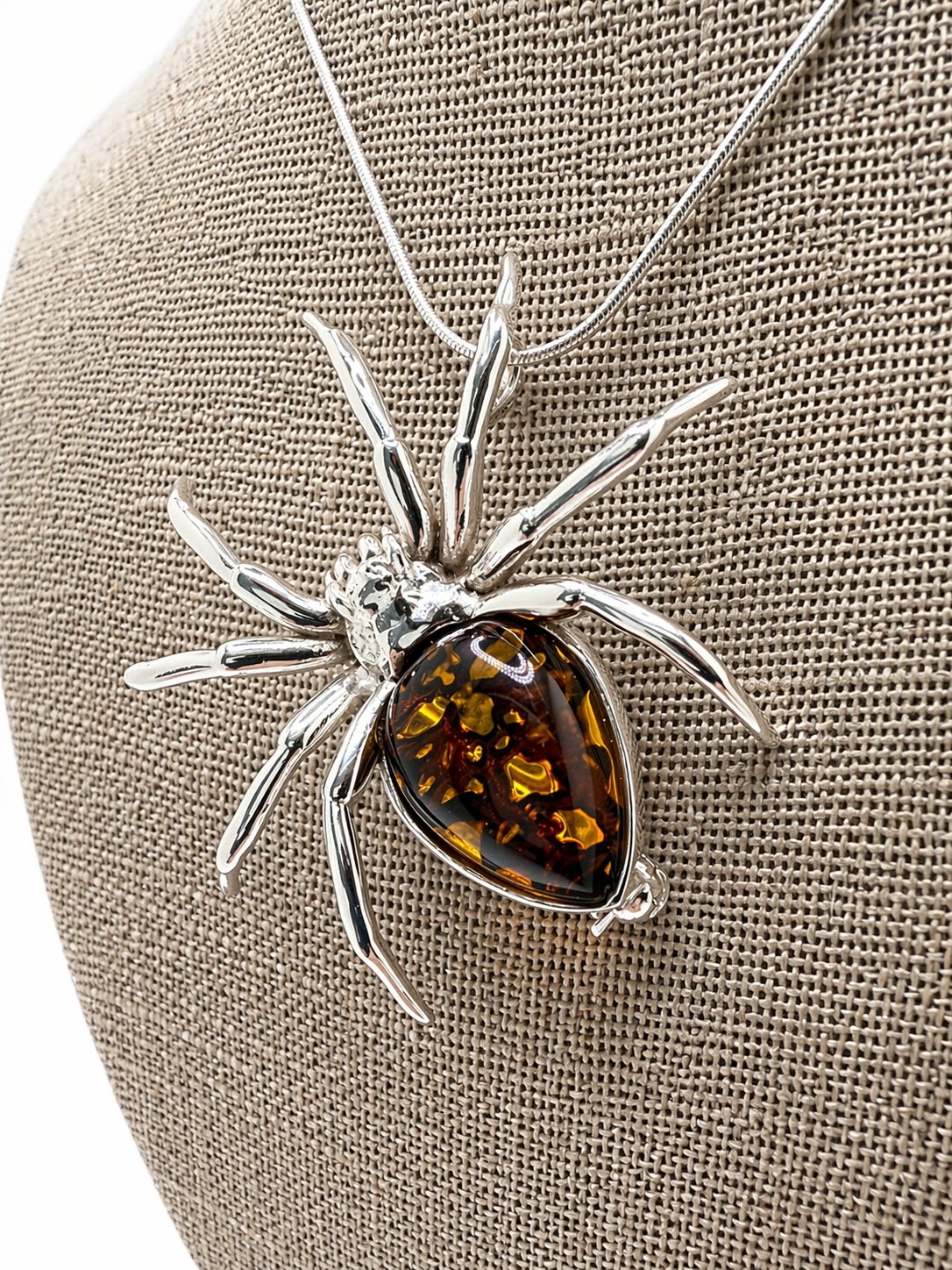 Golden Glow Crawler” – Sterling Silver & Honey Baltic Amber Spider Pendant