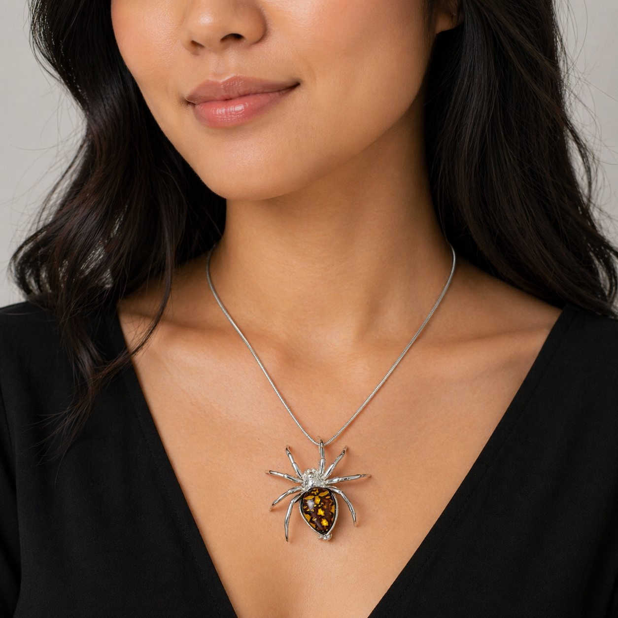 Golden Glow Crawler” – Sterling Silver & Honey Baltic Amber Spider Pendant