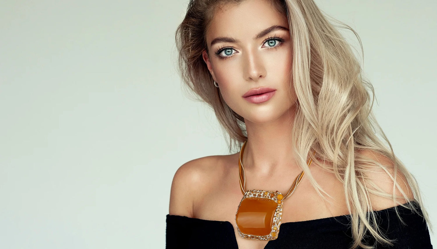 How to Style an Amber Necklace Without Looking Like a Fossil