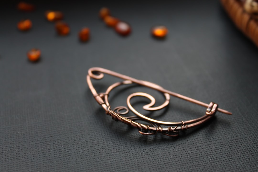 Why You Need an Amber Mouse Brooch in Your Life