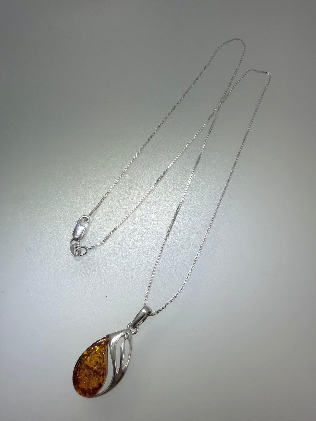 Baltic Amber & Sterling Silver Swirl Pendant on Silver Chain