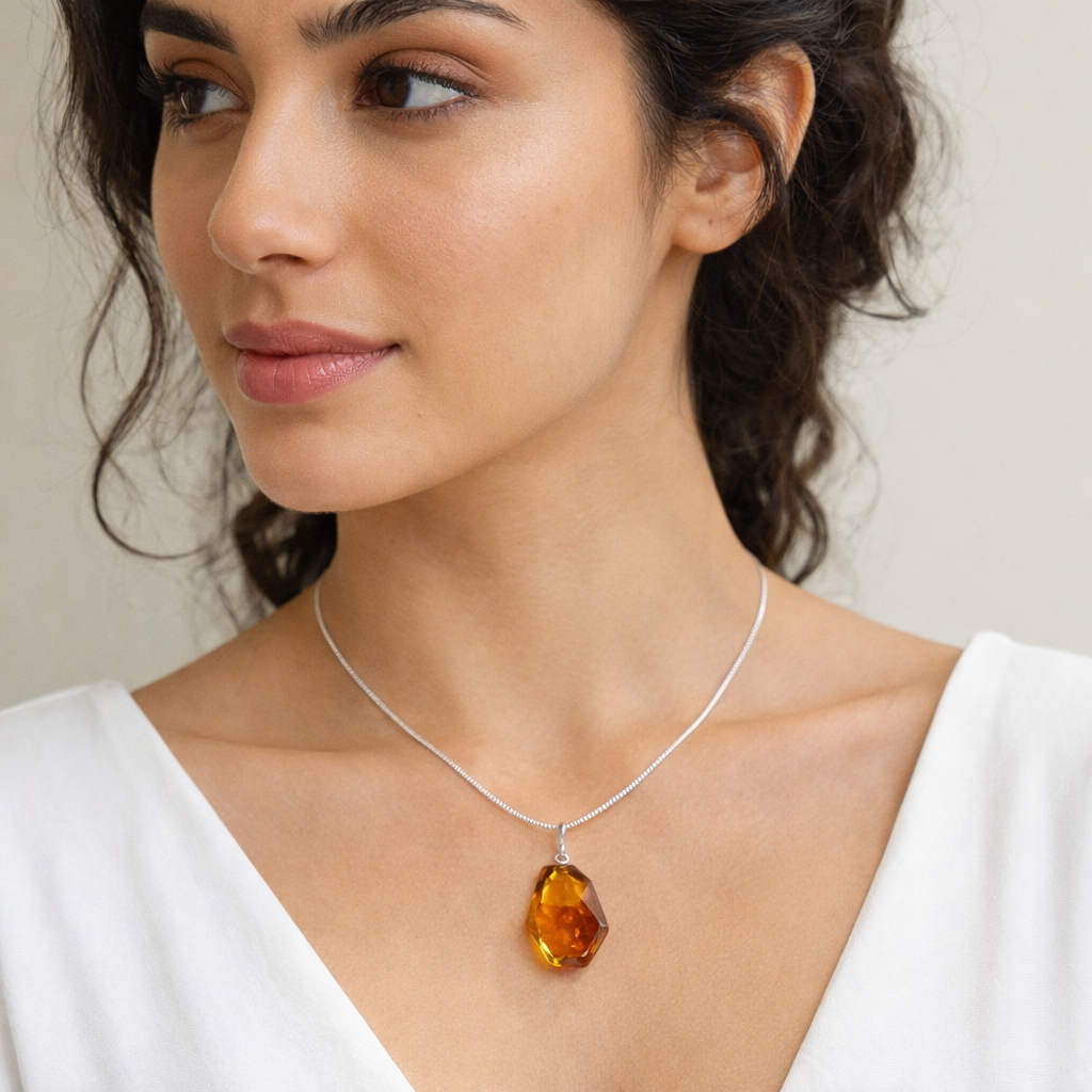Radiant lemon glow – Faceted lemon Baltic amber pendant on choice of silver chain