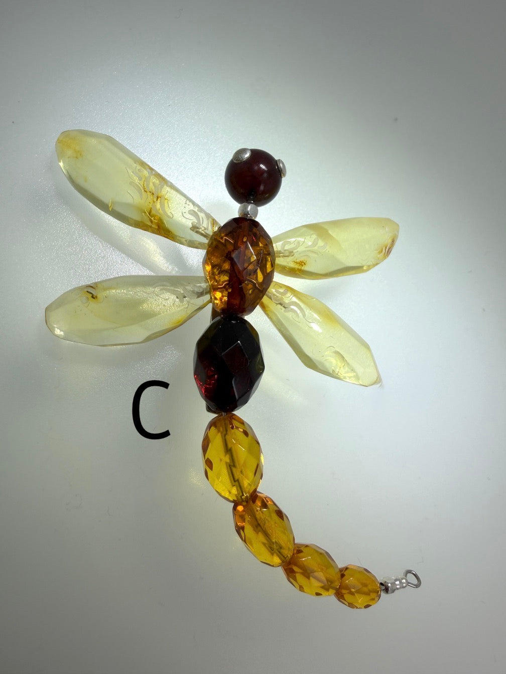 Genuine Baltic faceted amber and sterling silver dragonfly brooch