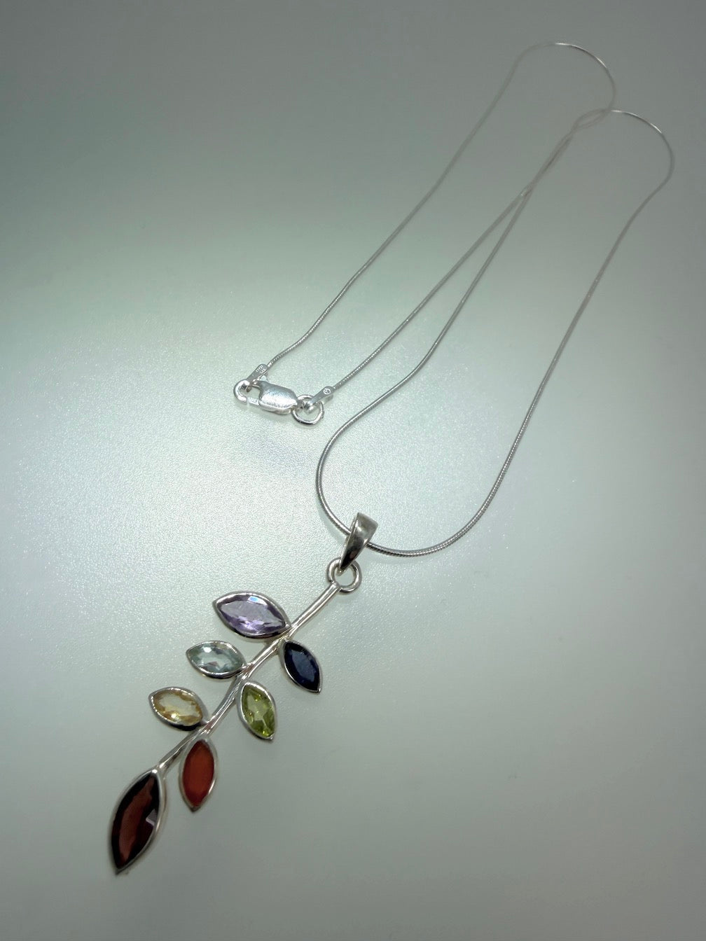 Multi-Stone Leaf Pendant Necklace – Sterling Silver with Amethyst, Blue Topaz, Peridot, Aquamarine & Quartz – Elegant Nature Inspired Jewelry