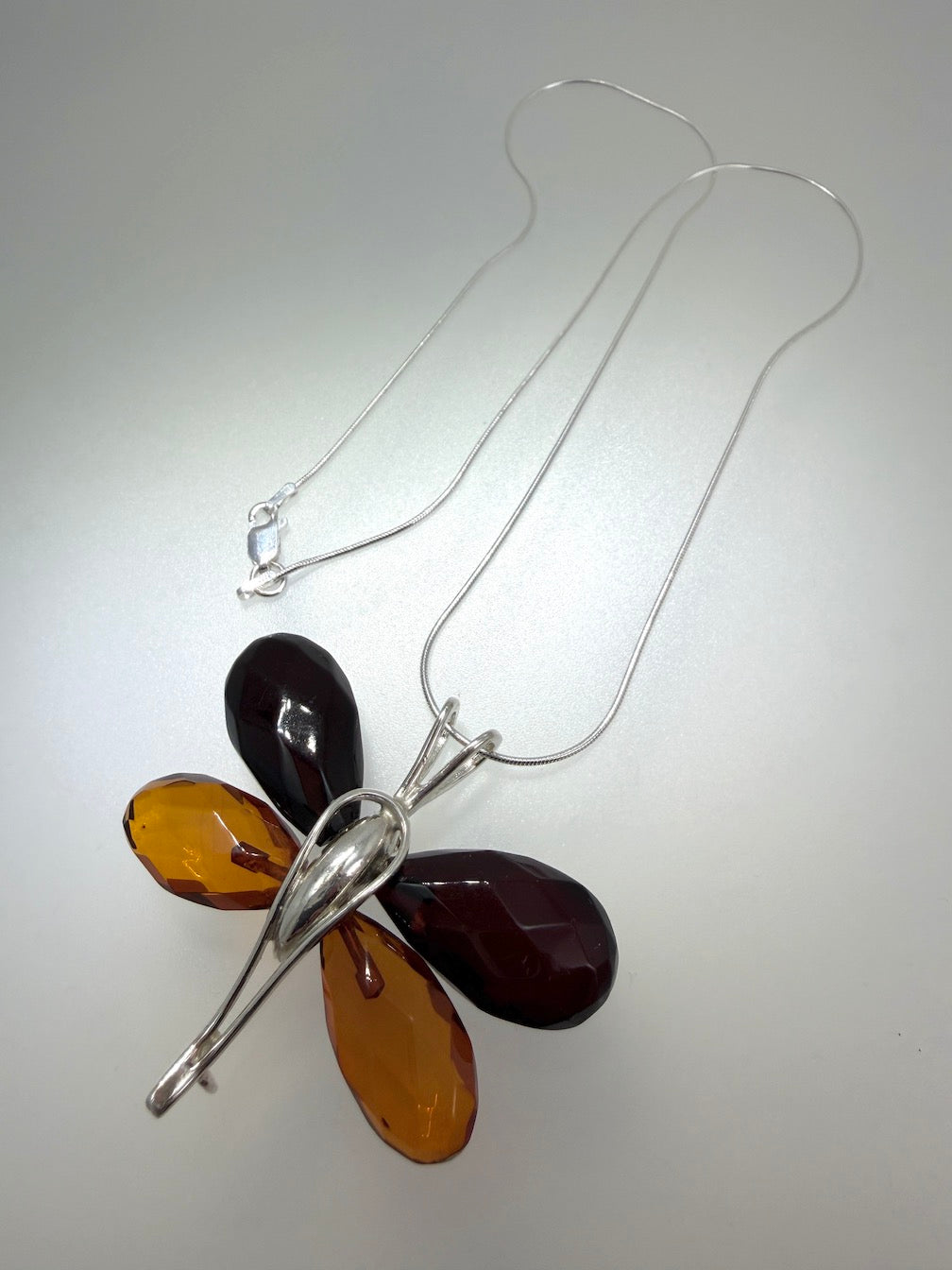 Handmade Sterling Silver & Baltic Amber Butterfly Pendant – Mixed Faceted Amber Wings