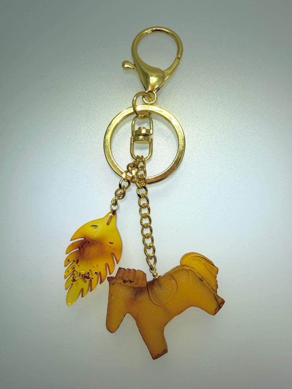 Handmade in Lithuania Genuine Baltic Amber Horse and Leaf Purse Charm – Elegant Laser-Cut Accent