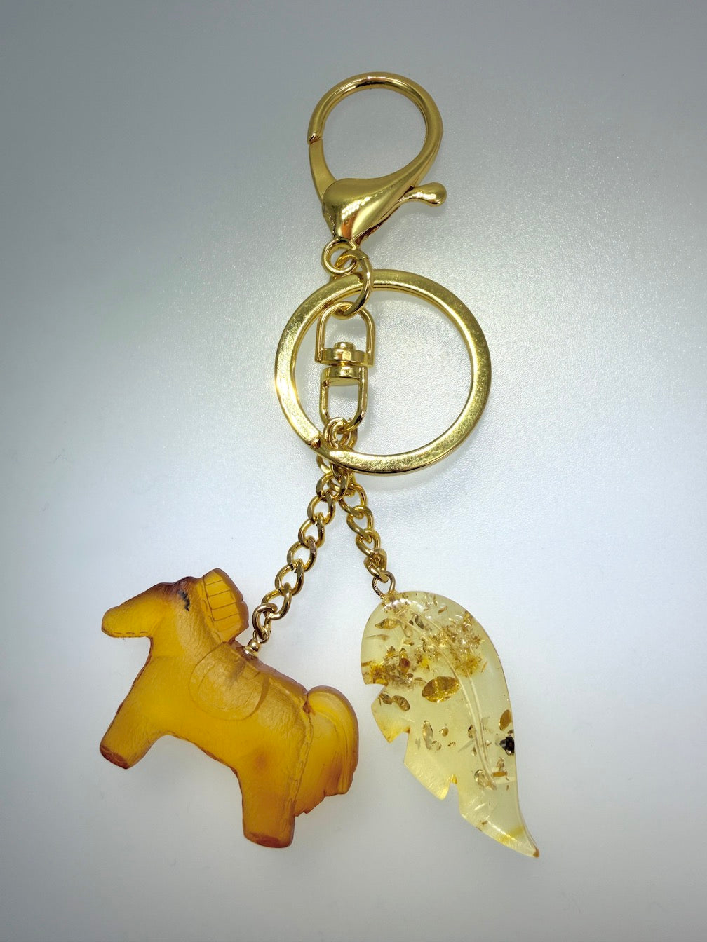 Handmade in Lithuania Genuine Baltic Amber Horse and Leaf Purse Charm – Elegant Laser-Cut Accent