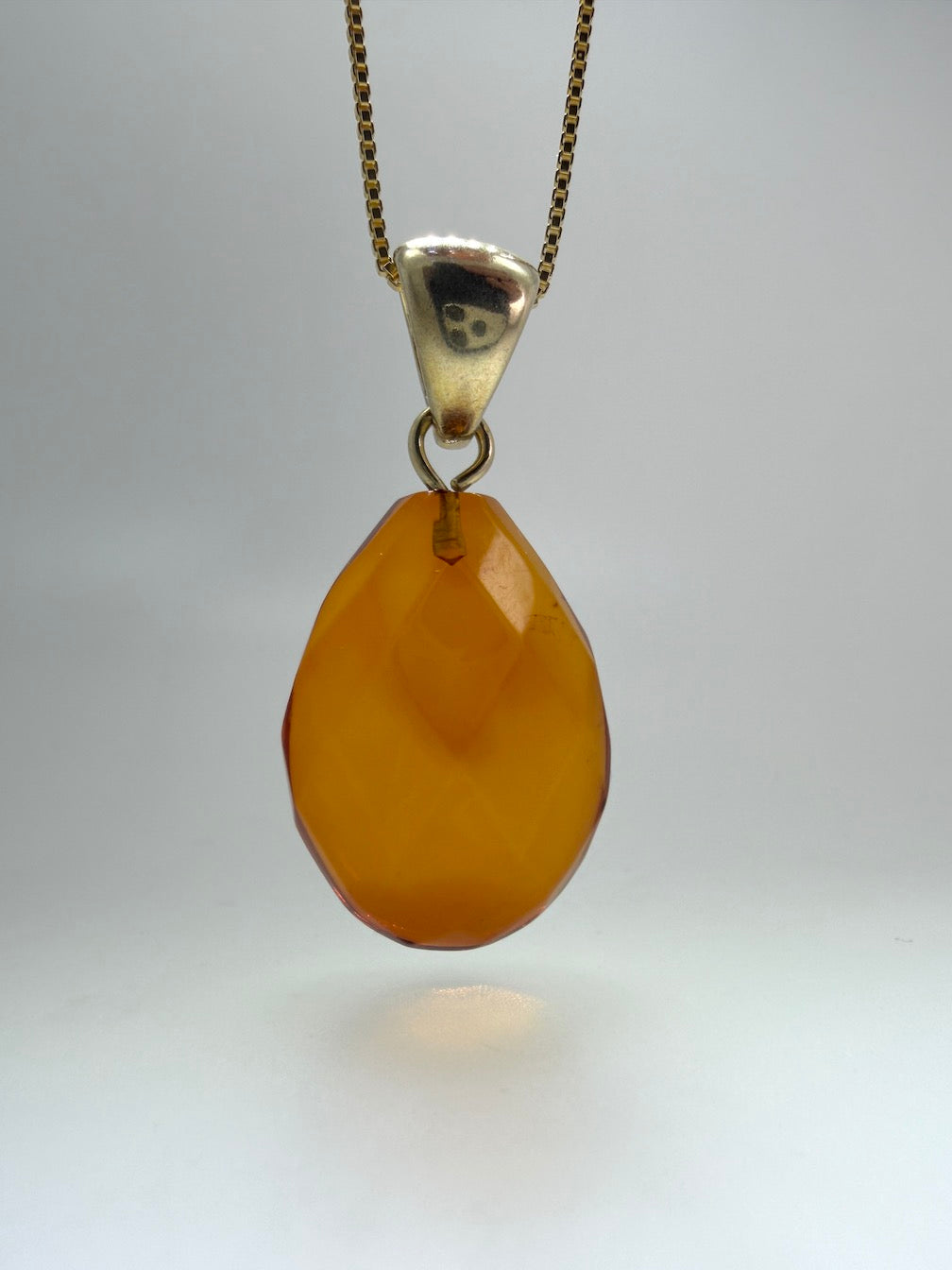 Baltic Amber Faceted Teardrop Pendant in Gold Platted Sterling Silver on Chain