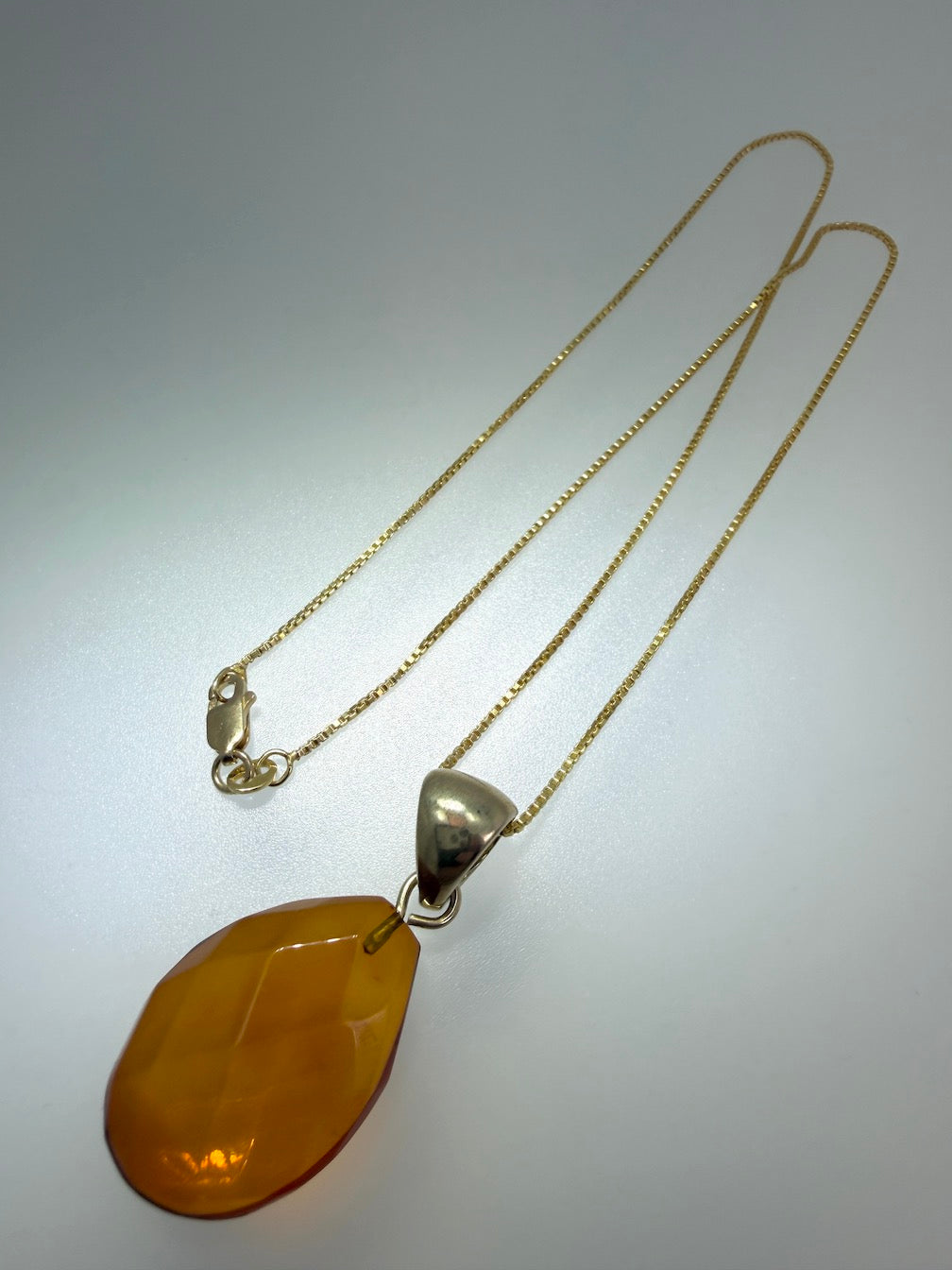 Baltic Amber Faceted Teardrop Pendant in Gold Platted Sterling Silver on Chain