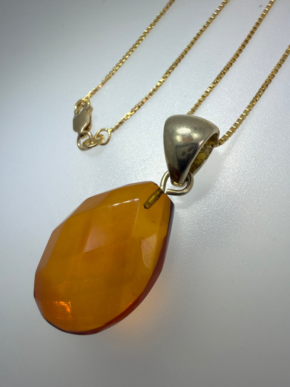 Baltic Amber Faceted Teardrop Pendant in Gold Platted Sterling Silver on Chain