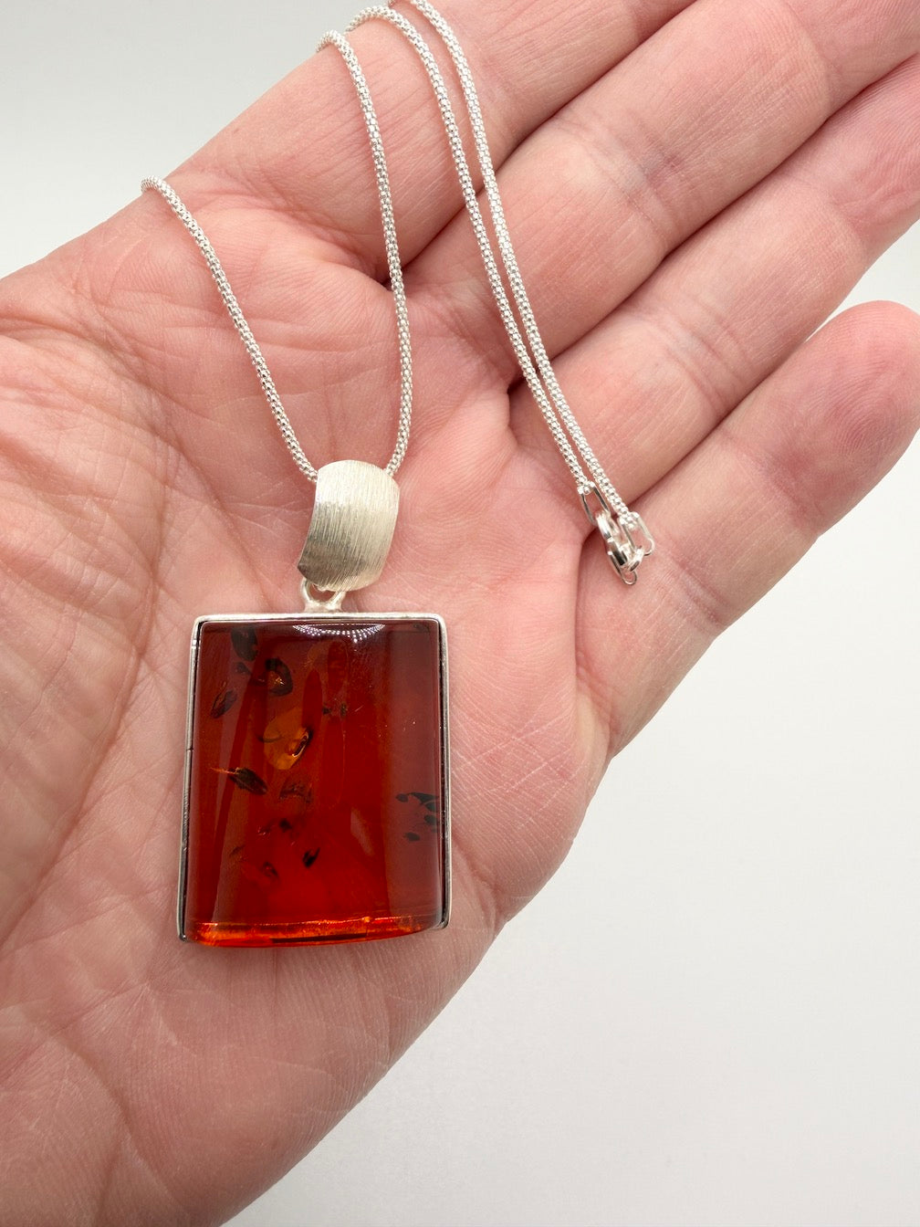 Handmade in Poland Modern Contemporary Sterling Silver Rectangular Brushed Pendant with Genuine Cognac Baltic Amber