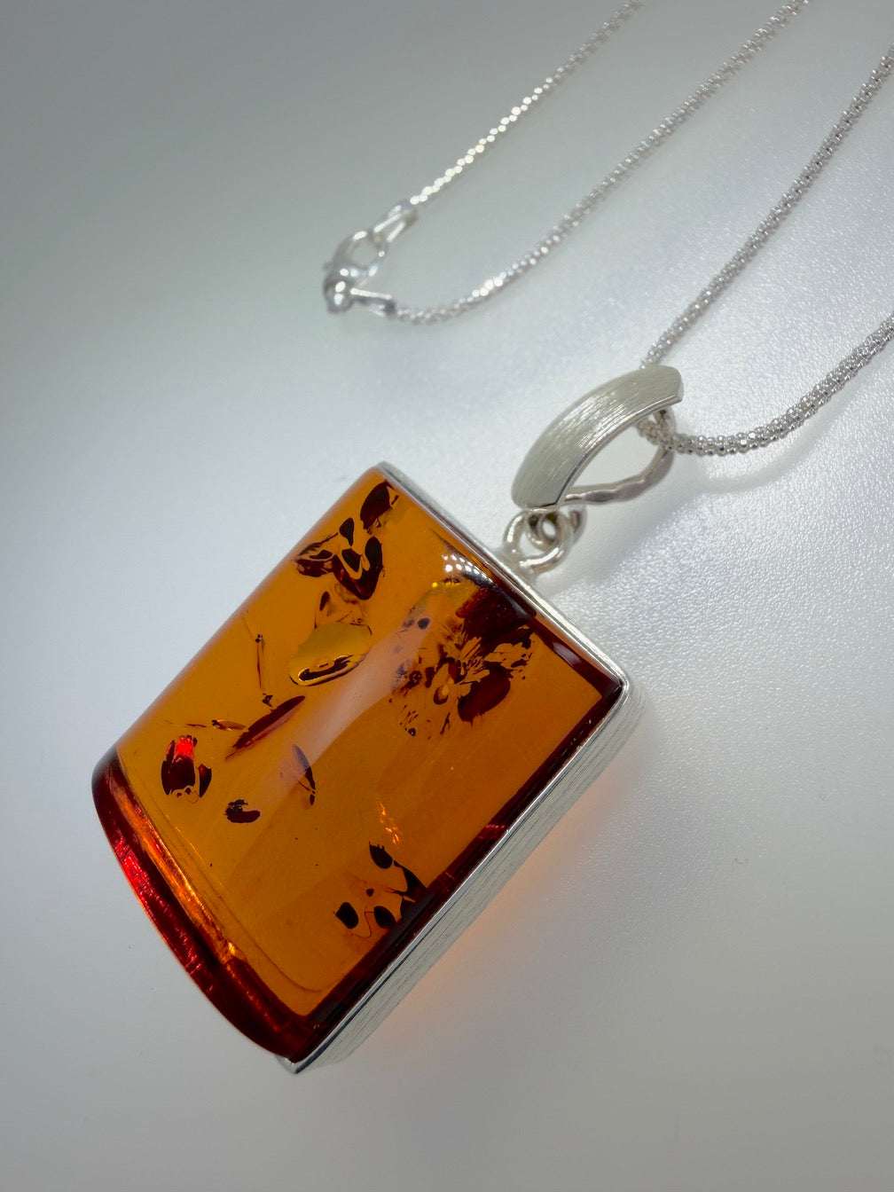 Handmade in Poland Modern Contemporary Sterling Silver Rectangular Brushed Pendant with Genuine Cognac Baltic Amber
