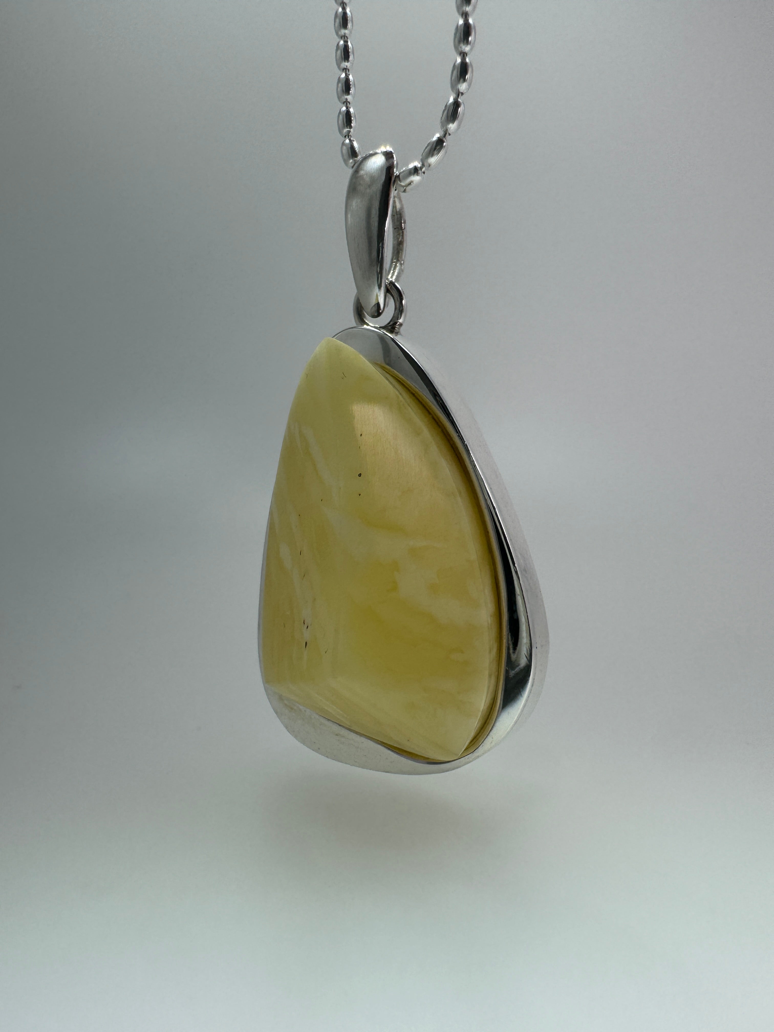 Handmade in Poland Sterling Silver Organic Faceted Triangular Pendant with Rare Butterscotch Baltic Amber – Modern Statement Necklace