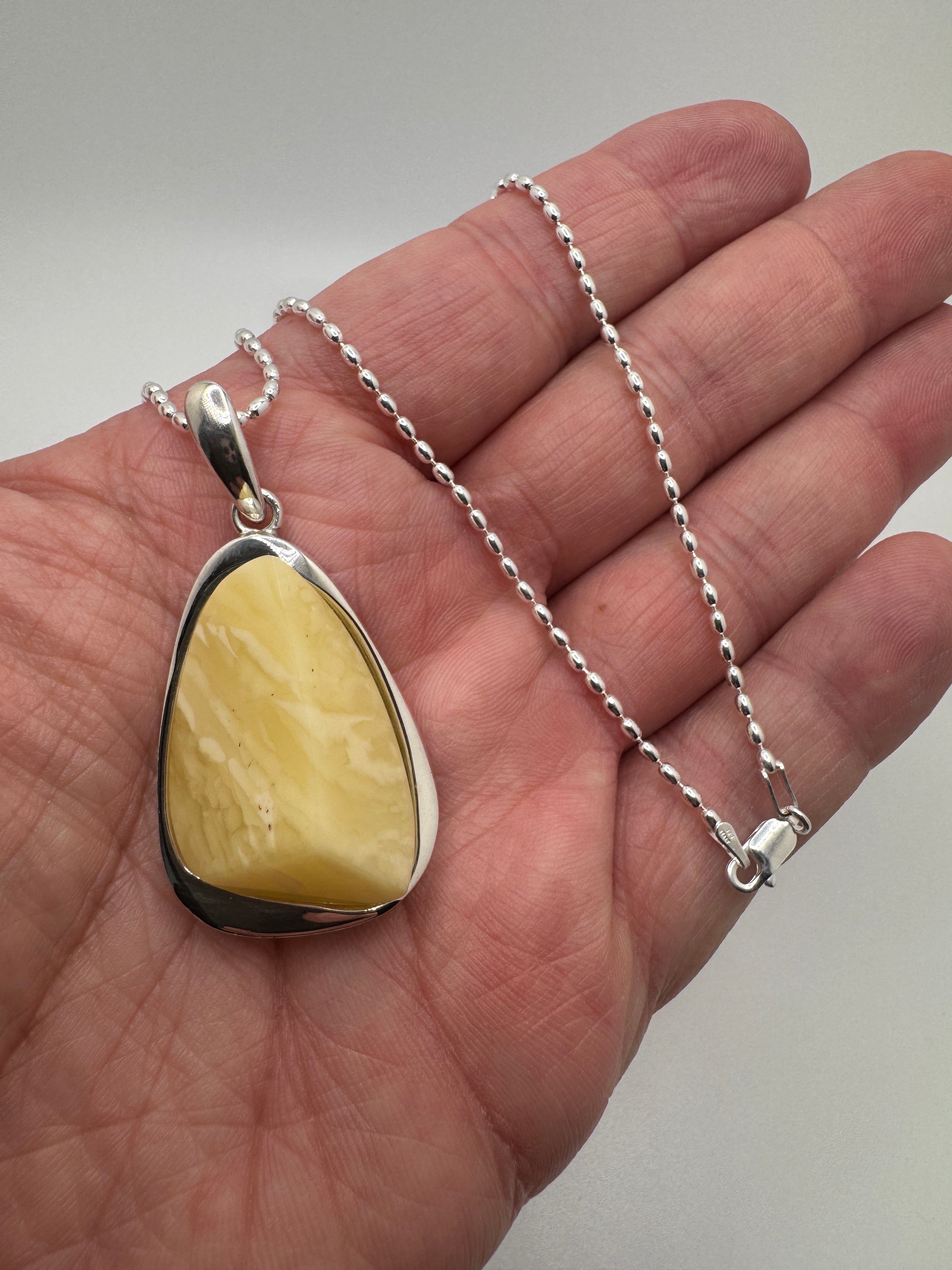 Handmade in Poland Sterling Silver Organic Faceted Triangular Pendant with Rare Butterscotch Baltic Amber – Modern Statement Necklace