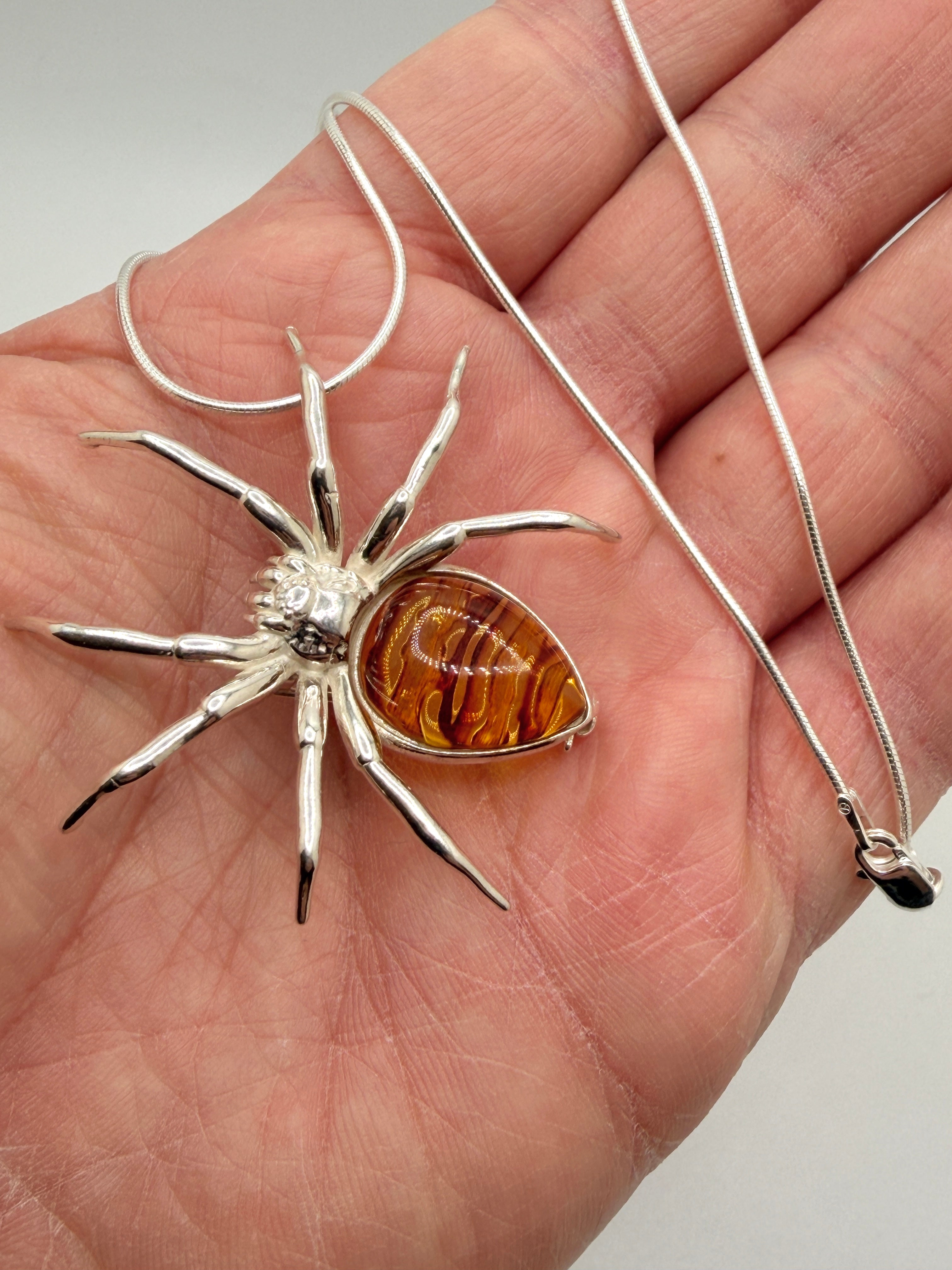 "Golden Glow Crawler" – Sterling Silver & Honey Baltic Amber Spider Pendant