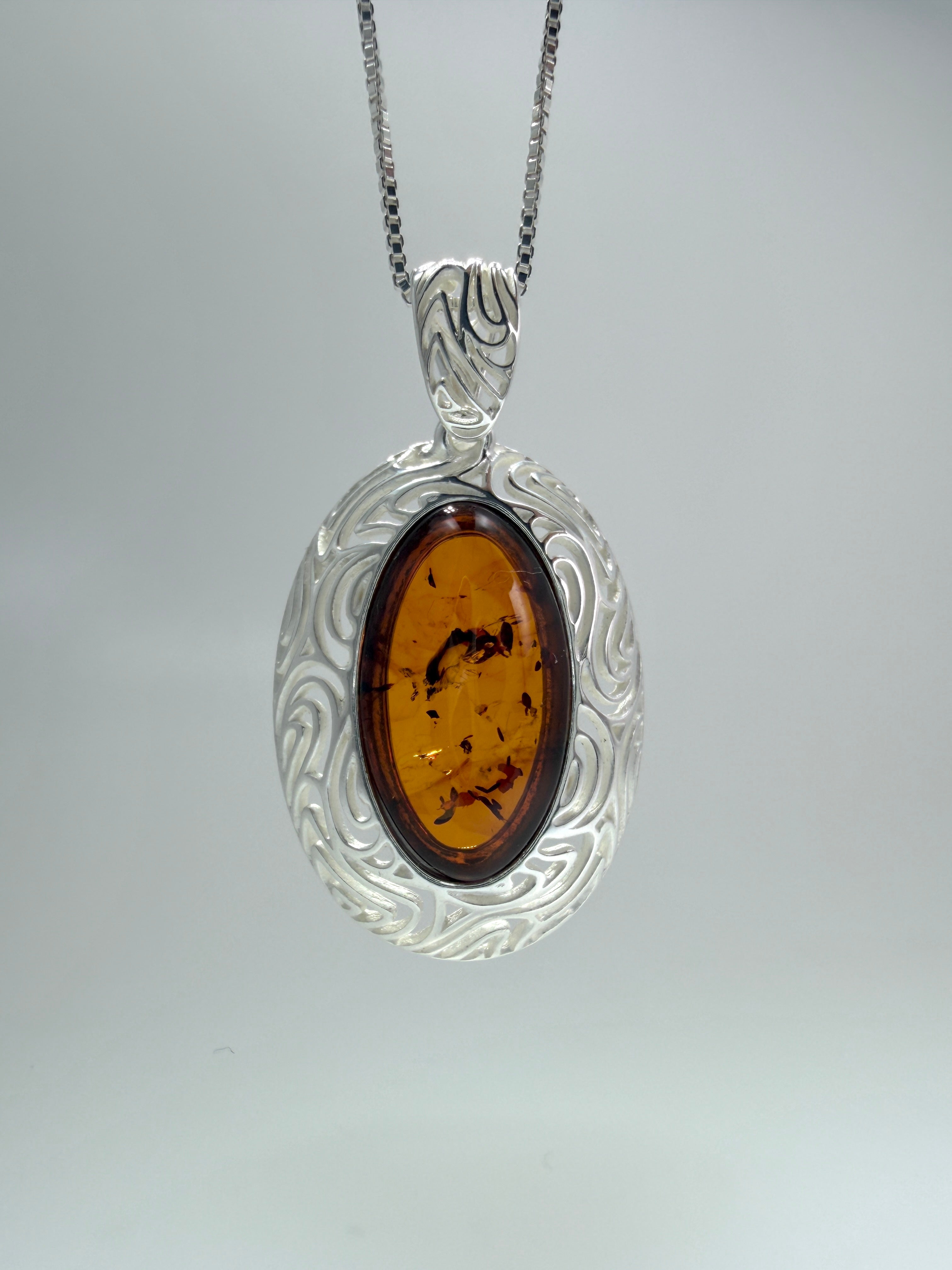 Sterling Silver Oval Honey Baltic Amber Pendant Necklace | Modern Whimsical Design