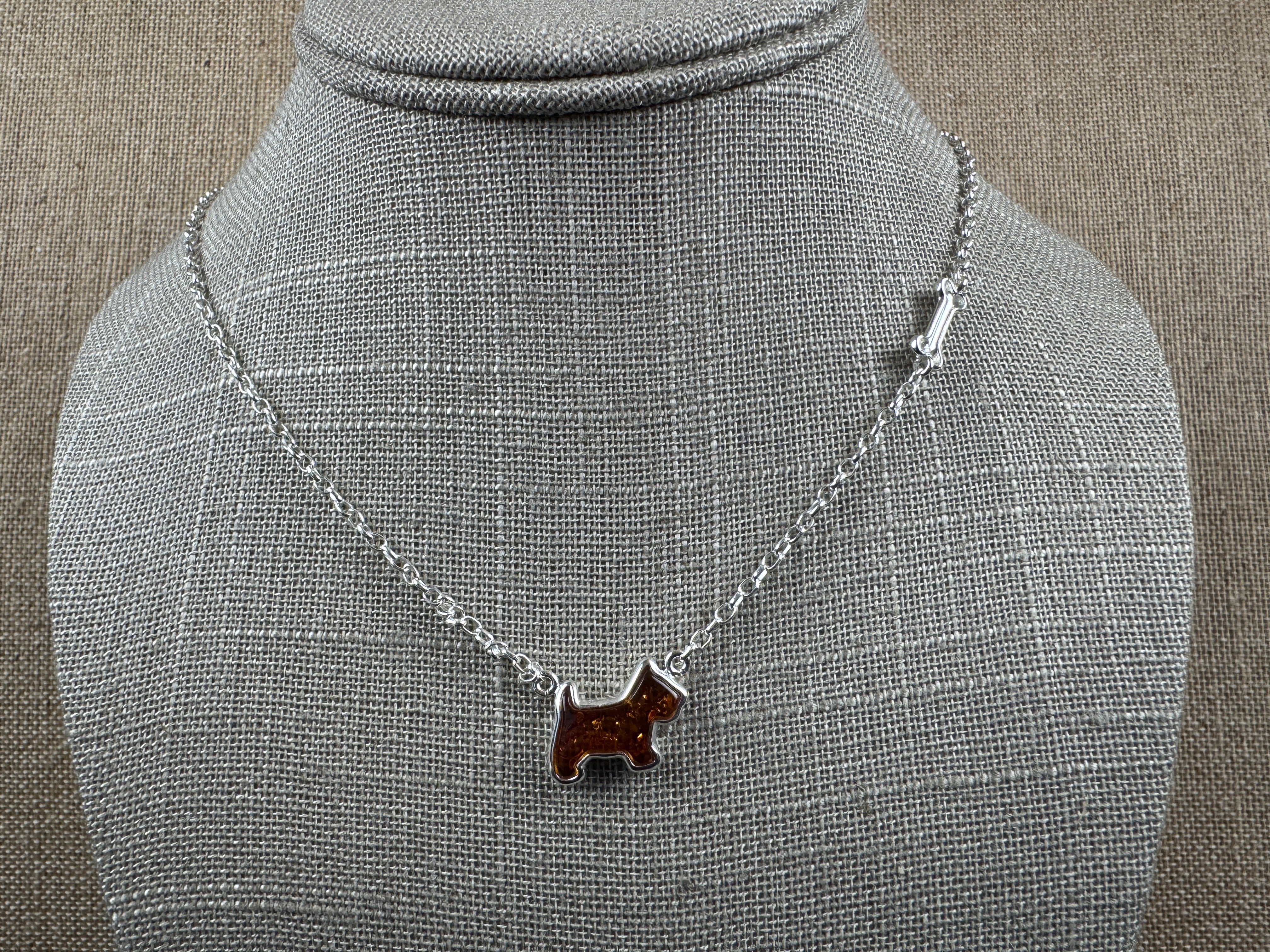 Sterling Silver Dog & Bone Necklace – Hand-Carved Honey Baltic Amber Pup with Extension Charm