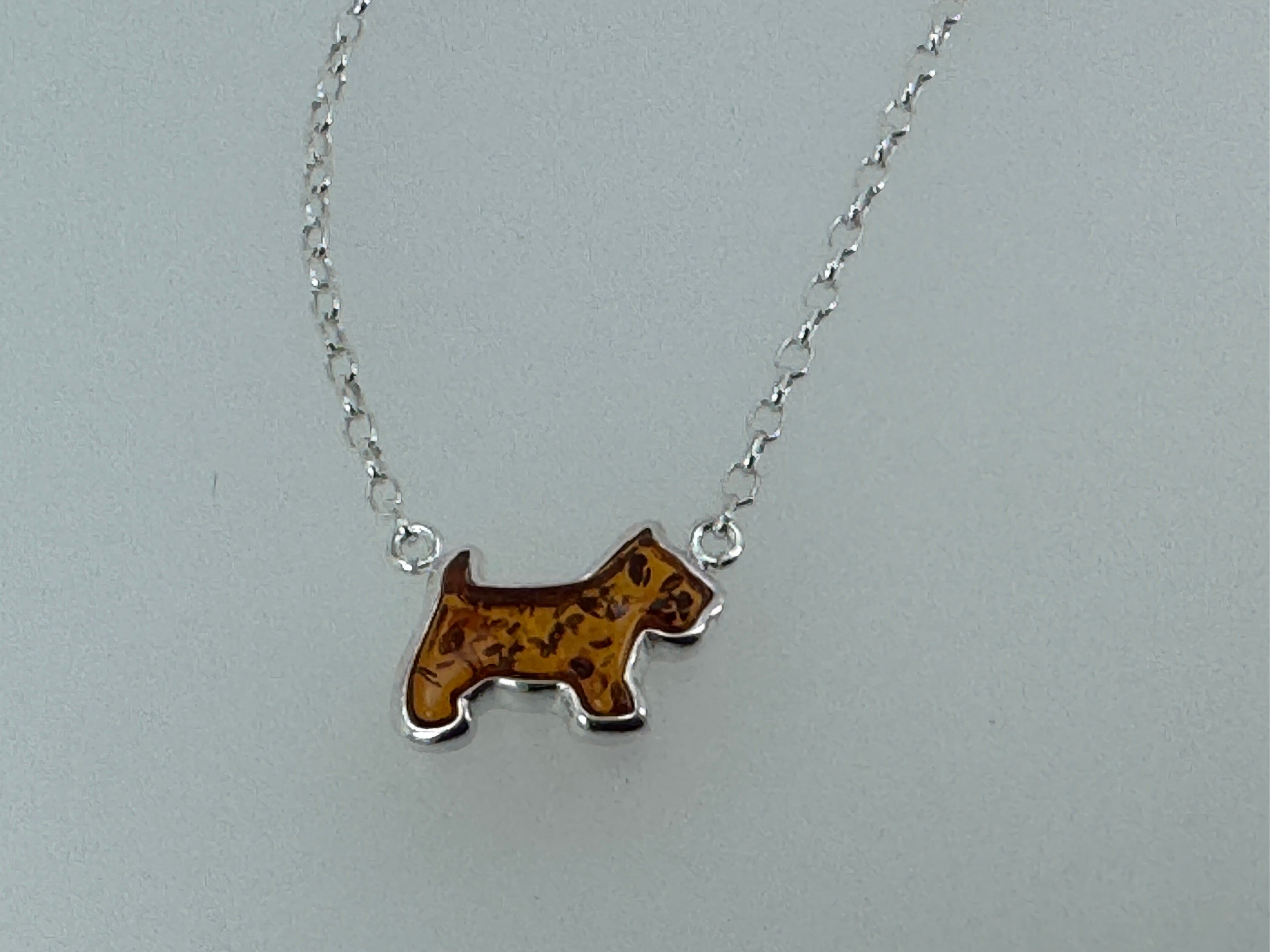 Sterling Silver Dog & Bone Necklace – Hand-Carved Honey Baltic Amber Pup with Extension Charm