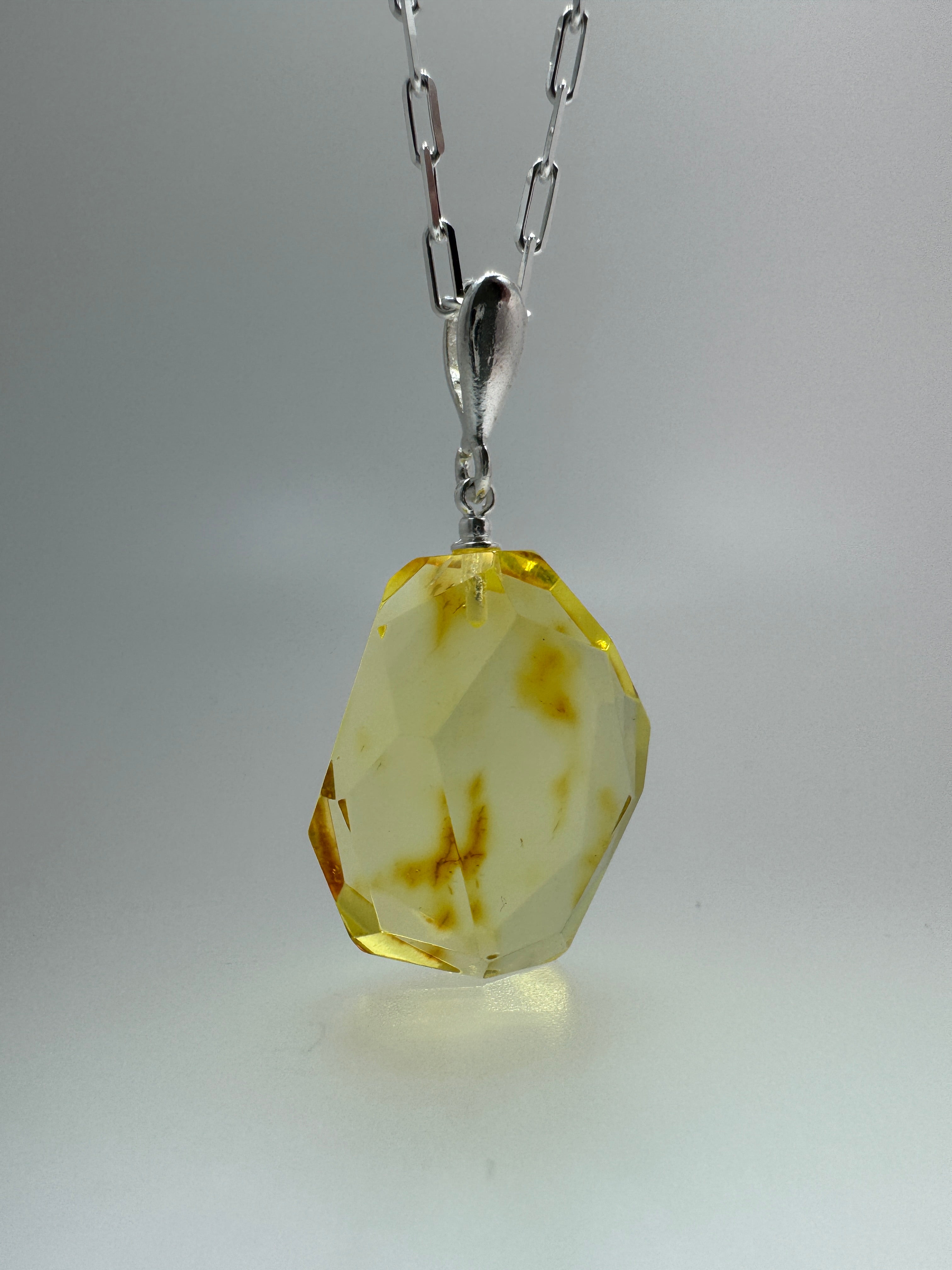 Radiant lemon glow – Faceted lemon Baltic amber pendant on choice of silver chain