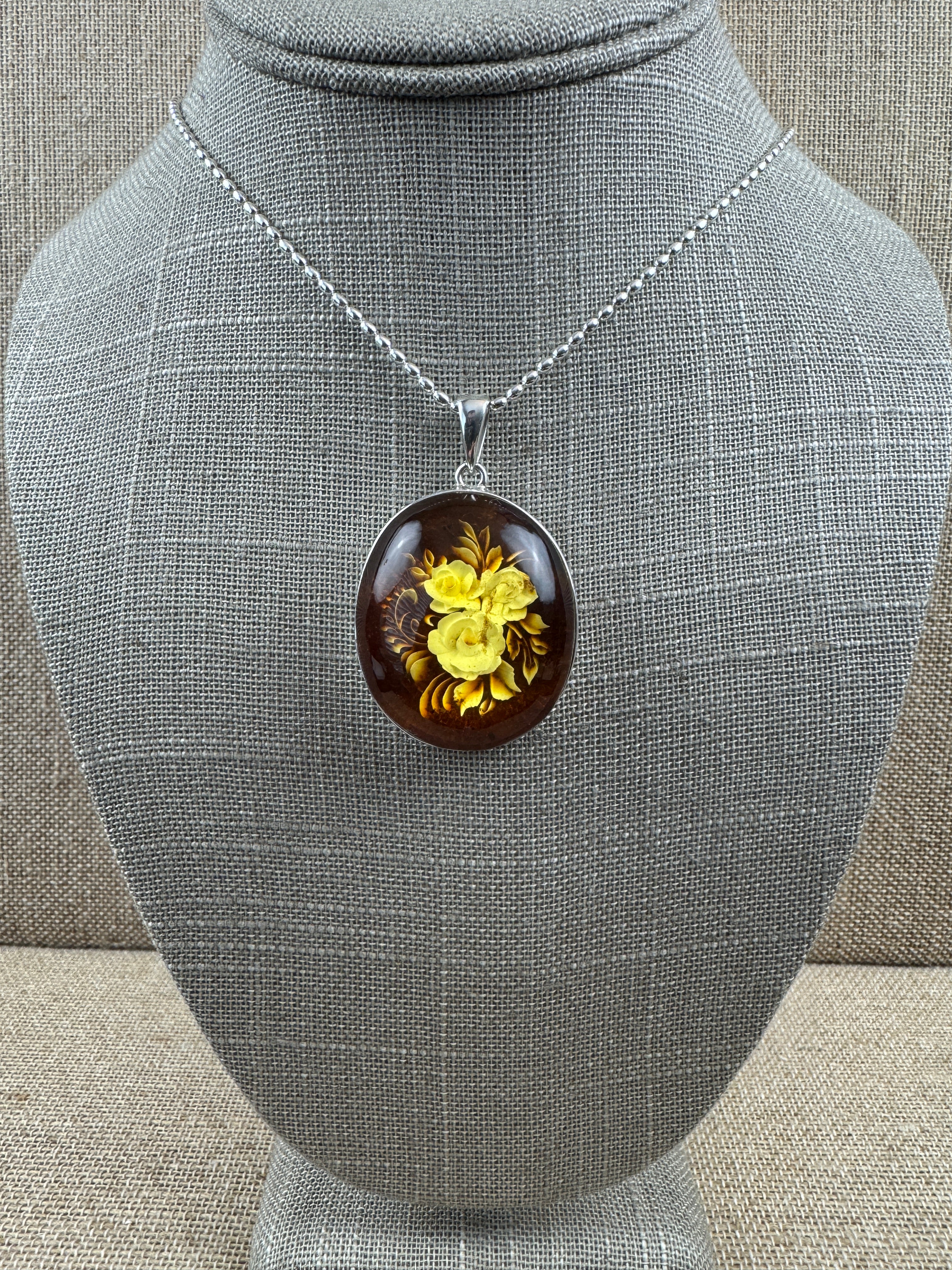 Timeless Elegance: Hand-Carved Baltic Amber Intaglio Flower Pendant