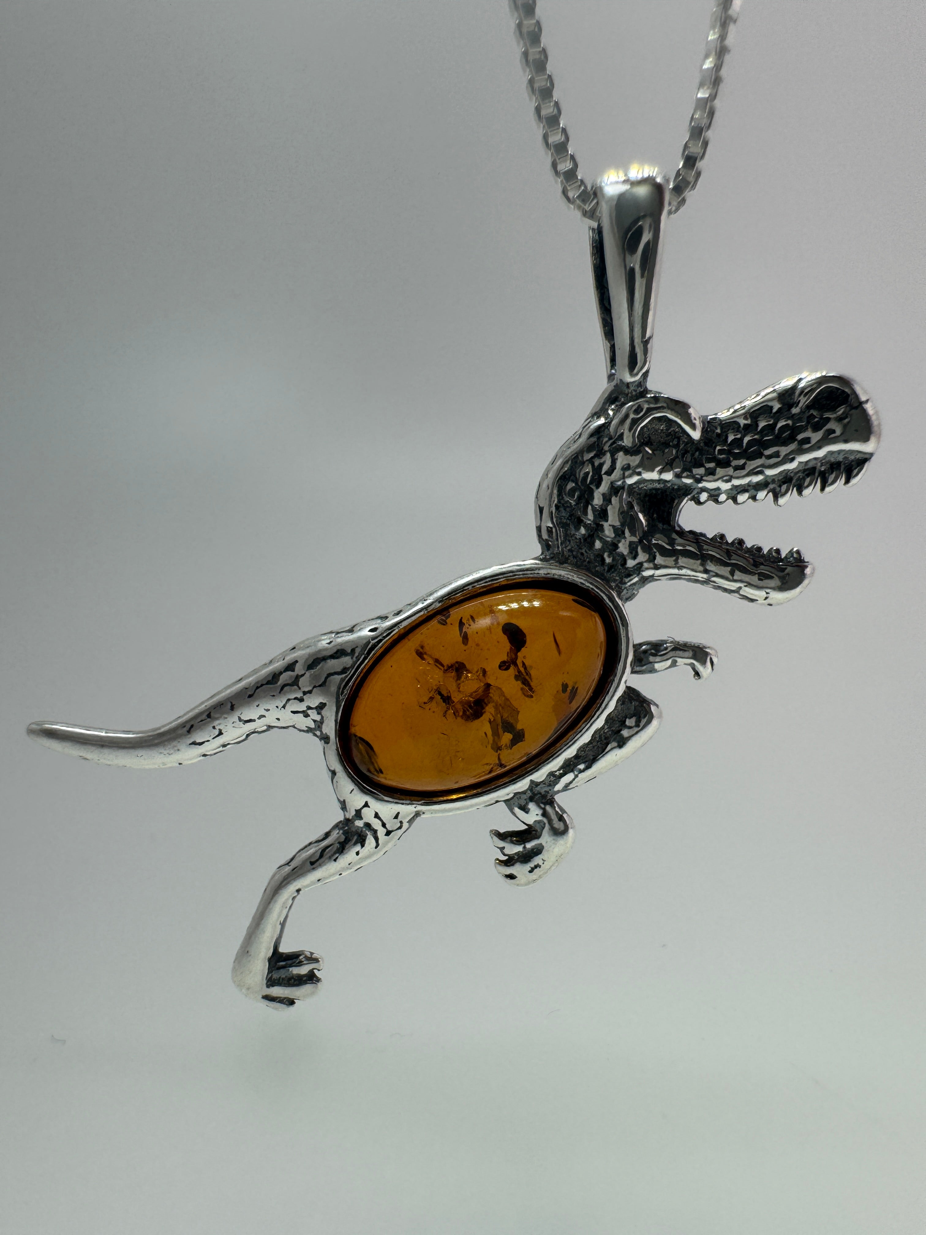 Tiny T-Rex Terror! Baltic Amber Dino Pendant - Shipped on Silver chain or leather