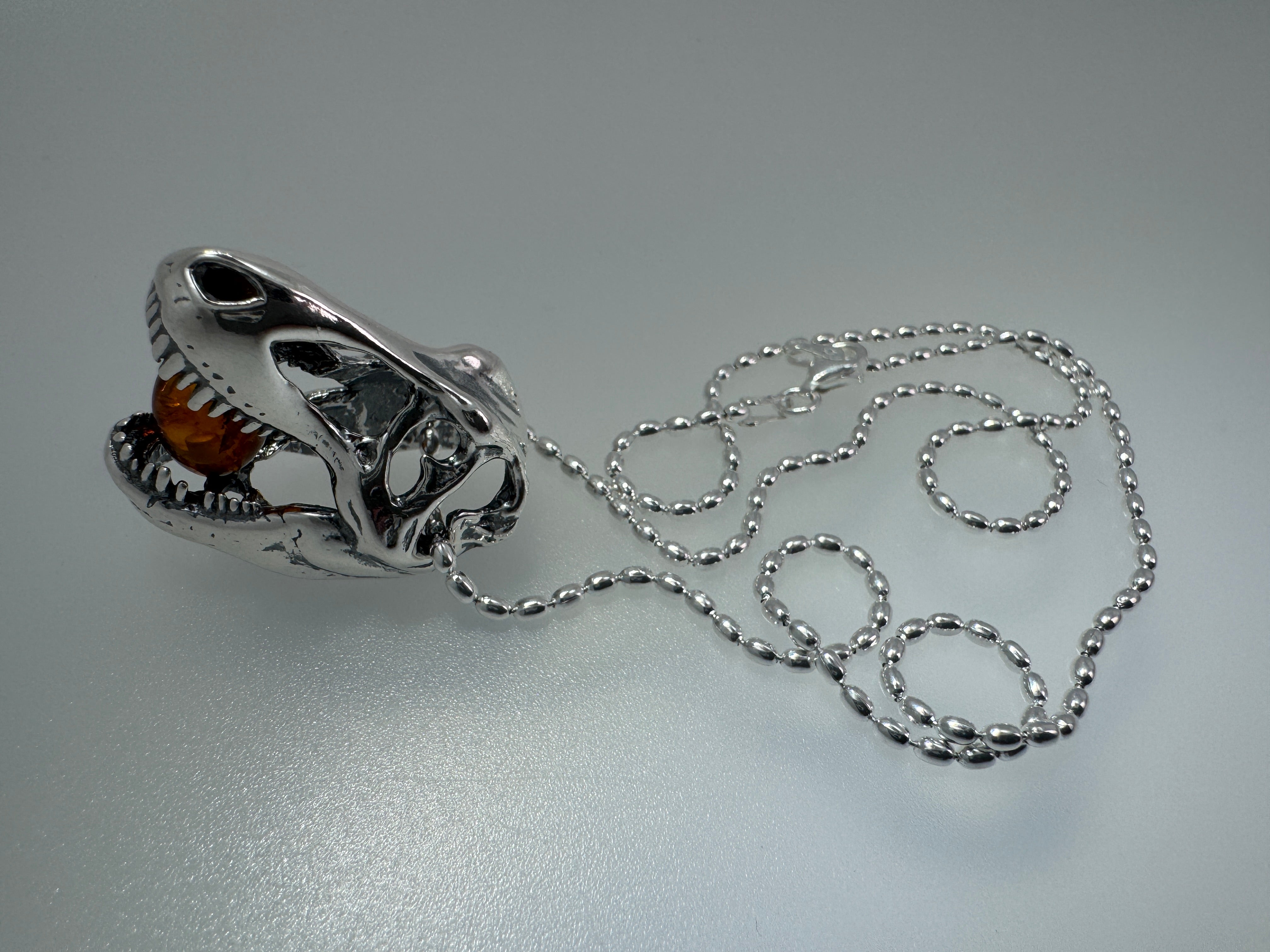 Sterling Silver Tyrannosaurus Rex Pendant with Baltic Amber – Fierce & Fossil-Inspired - Shipped with Silver Chain