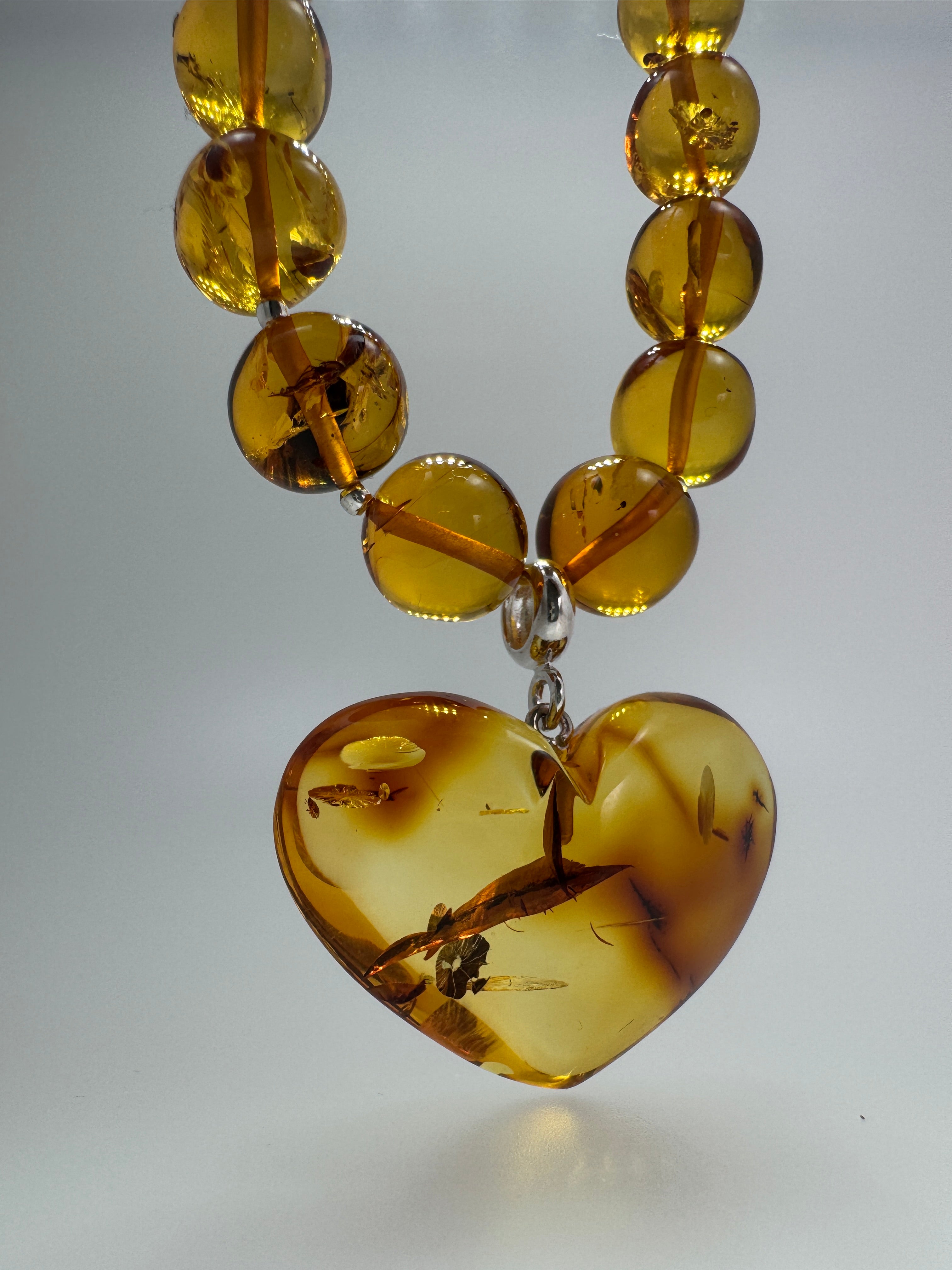 Heart of Amber: One-of-a-Kind Statement Necklace - Amber Beads with oversized Amber Heart Pendant Toggle Necklace
