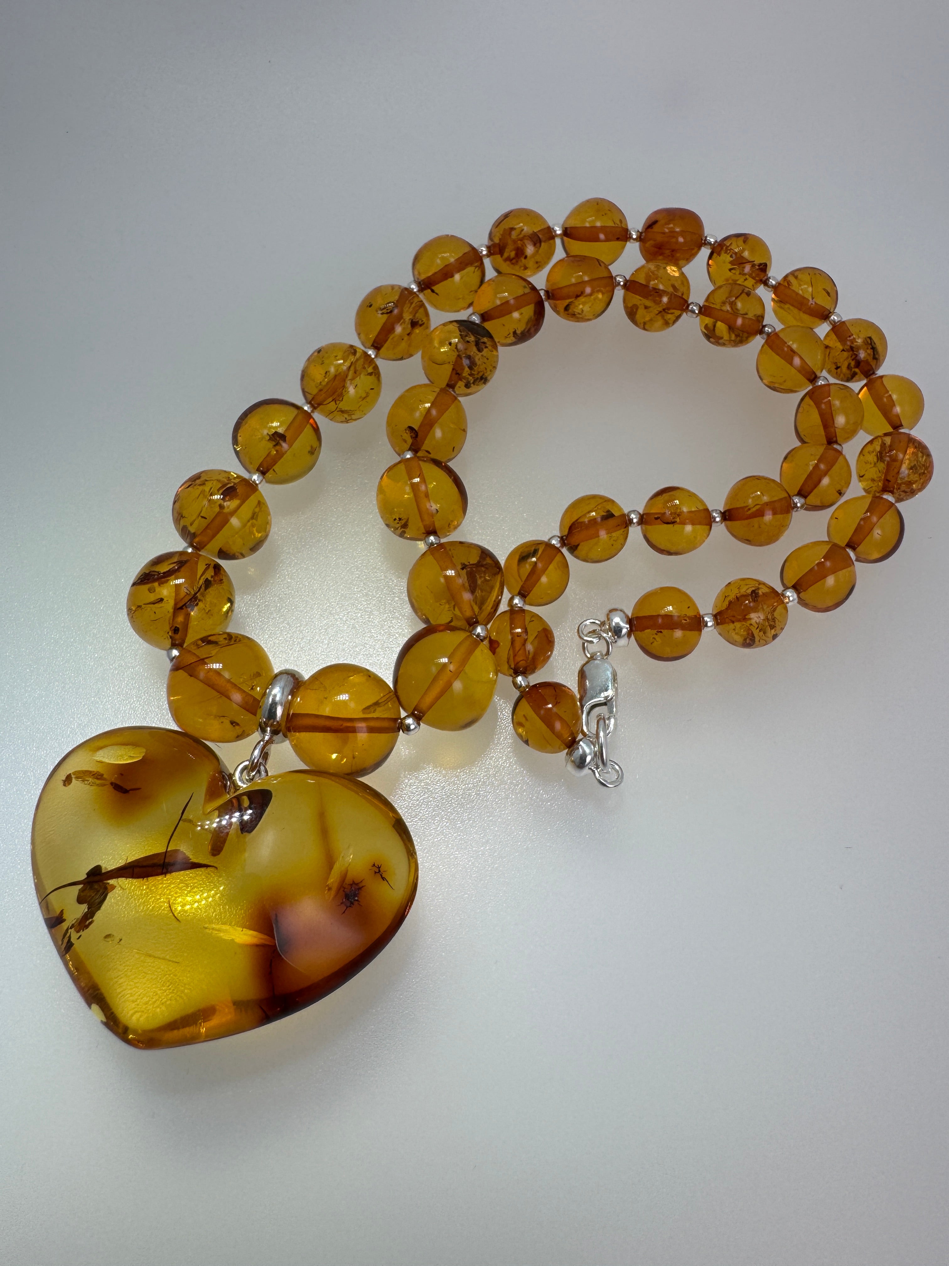 Heart of Amber: One-of-a-Kind Statement Necklace - Amber Beads with oversized Amber Heart Pendant Toggle Necklace