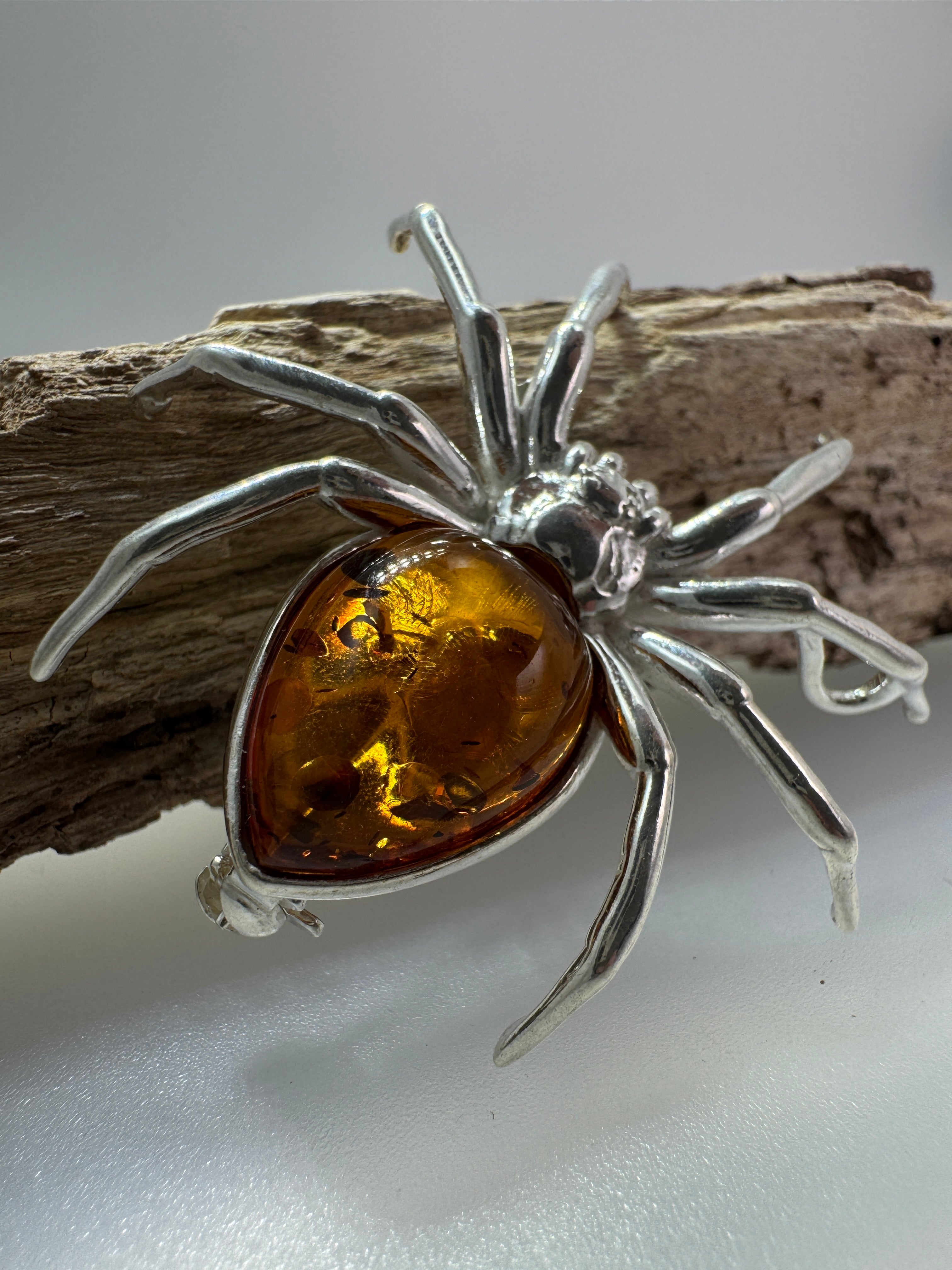 "Golden Glow Crawler" – Sterling Silver & Honey Baltic Amber Spider Pendant