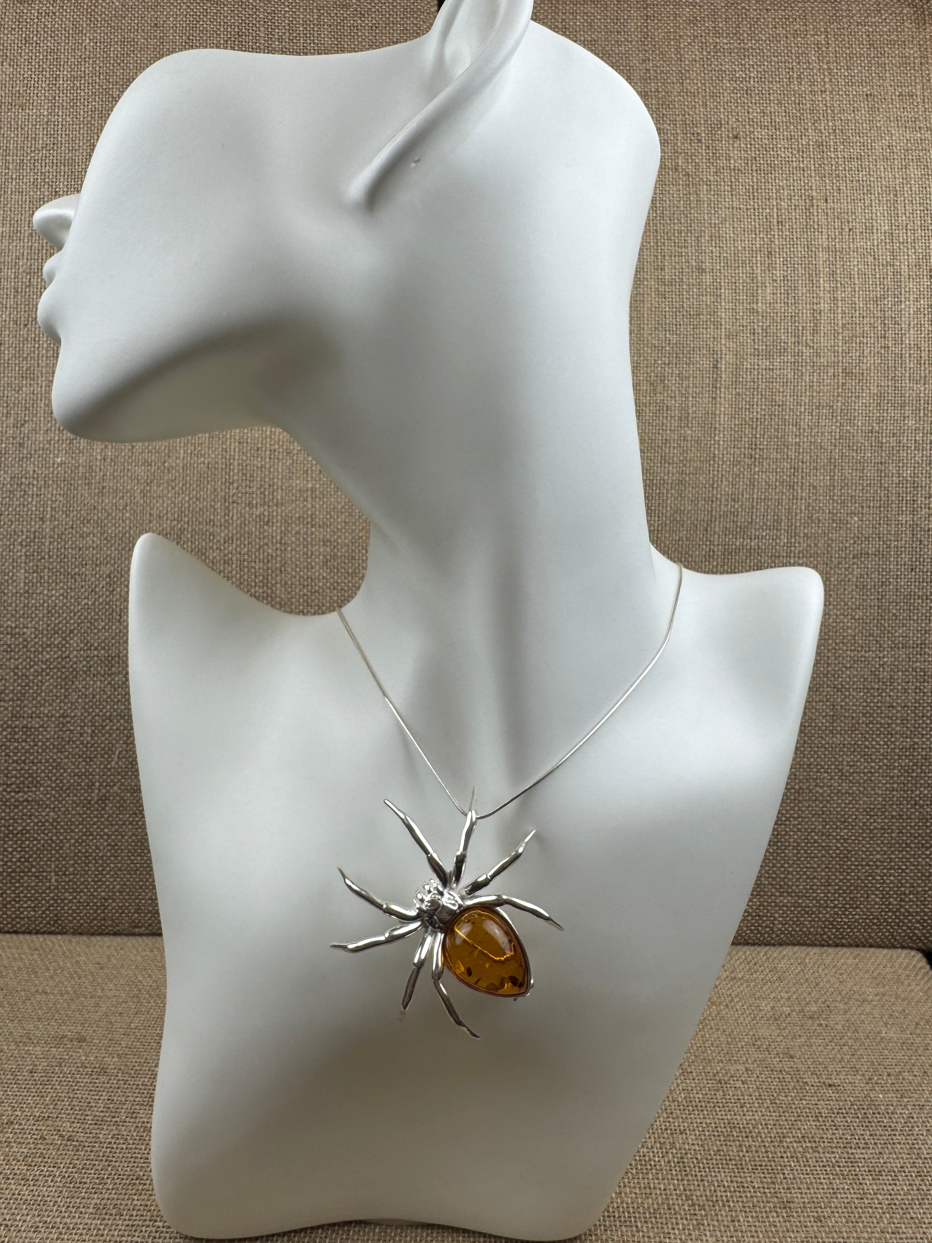 "Golden Glow Crawler" – Sterling Silver & Honey Baltic Amber Spider Pendant