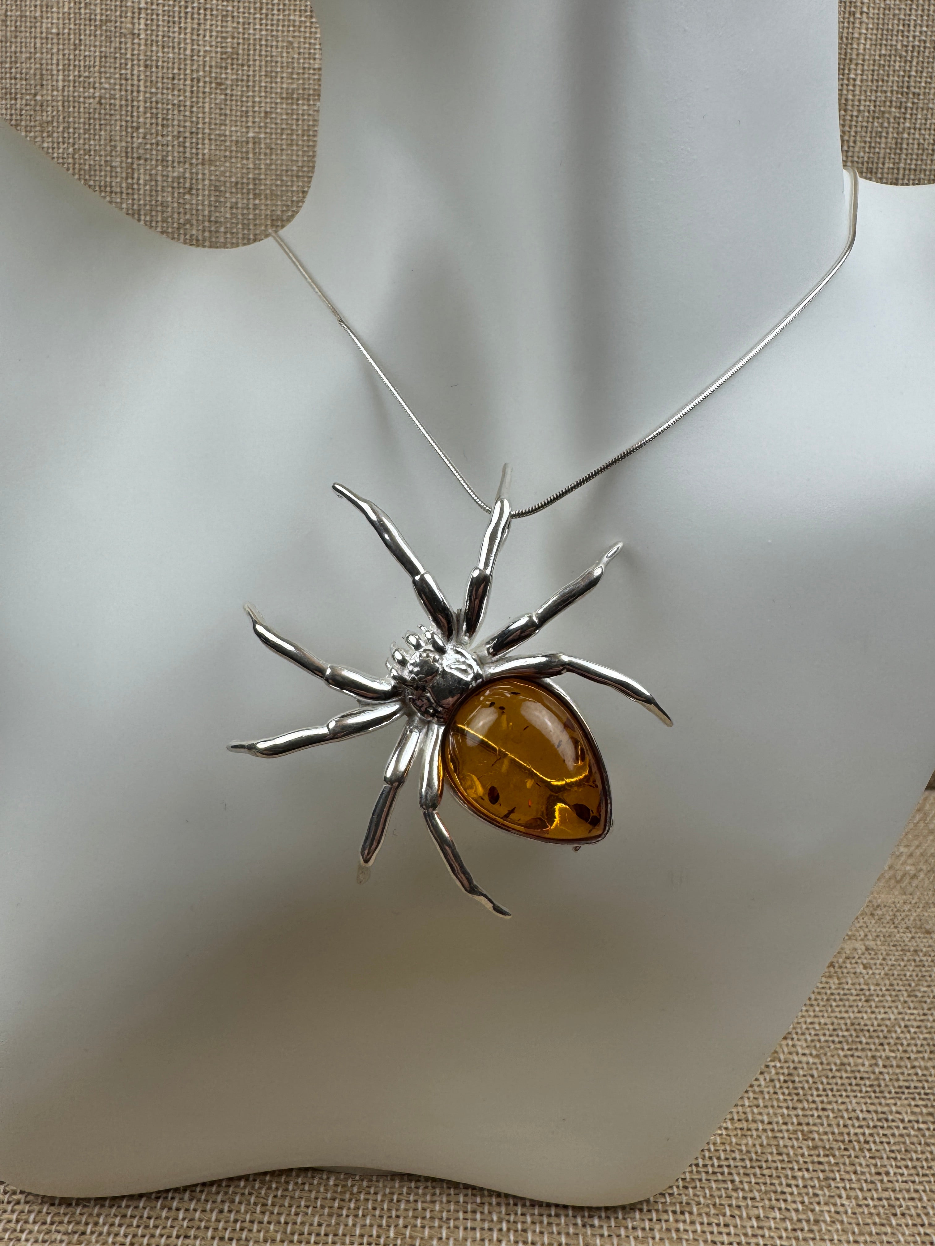 "Golden Glow Crawler" – Sterling Silver & Honey Baltic Amber Spider Pendant