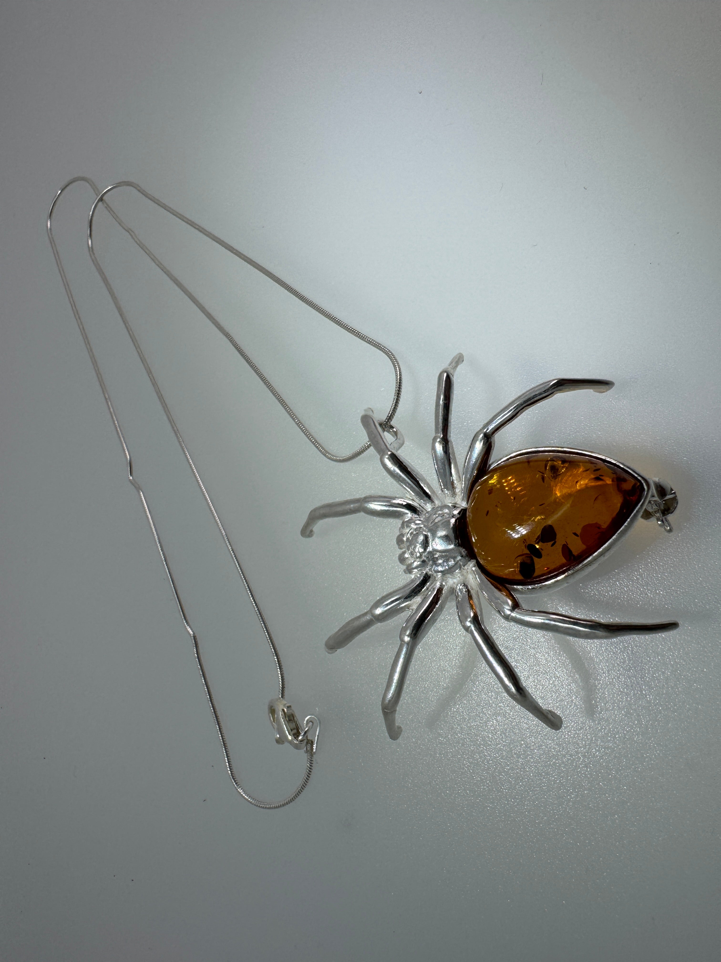 "Golden Glow Crawler" – Sterling Silver & Honey Baltic Amber Spider Pendant