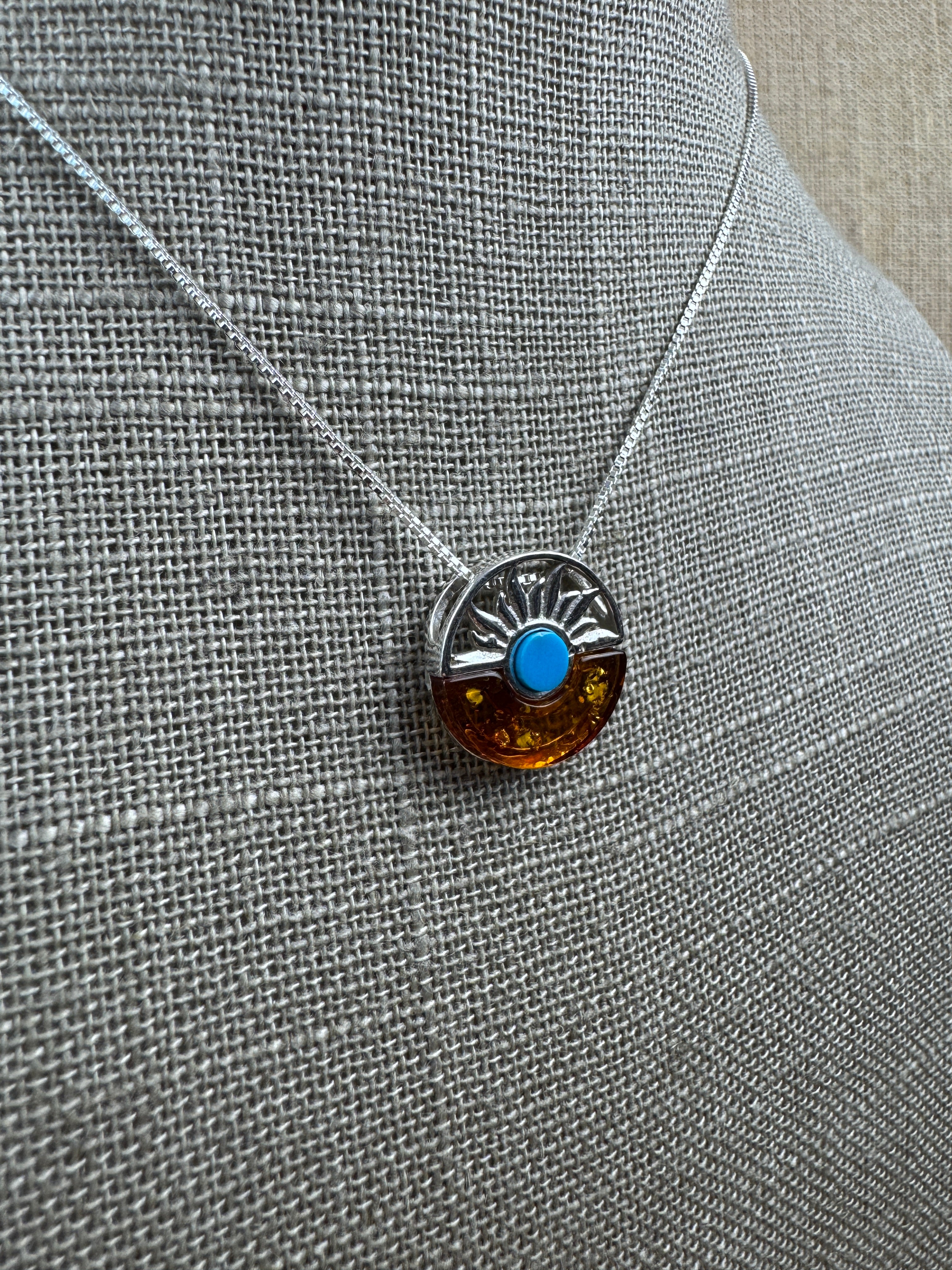 Baltic amber and turquoise pendant on silver chain - A timeless fusion of cultures and nature