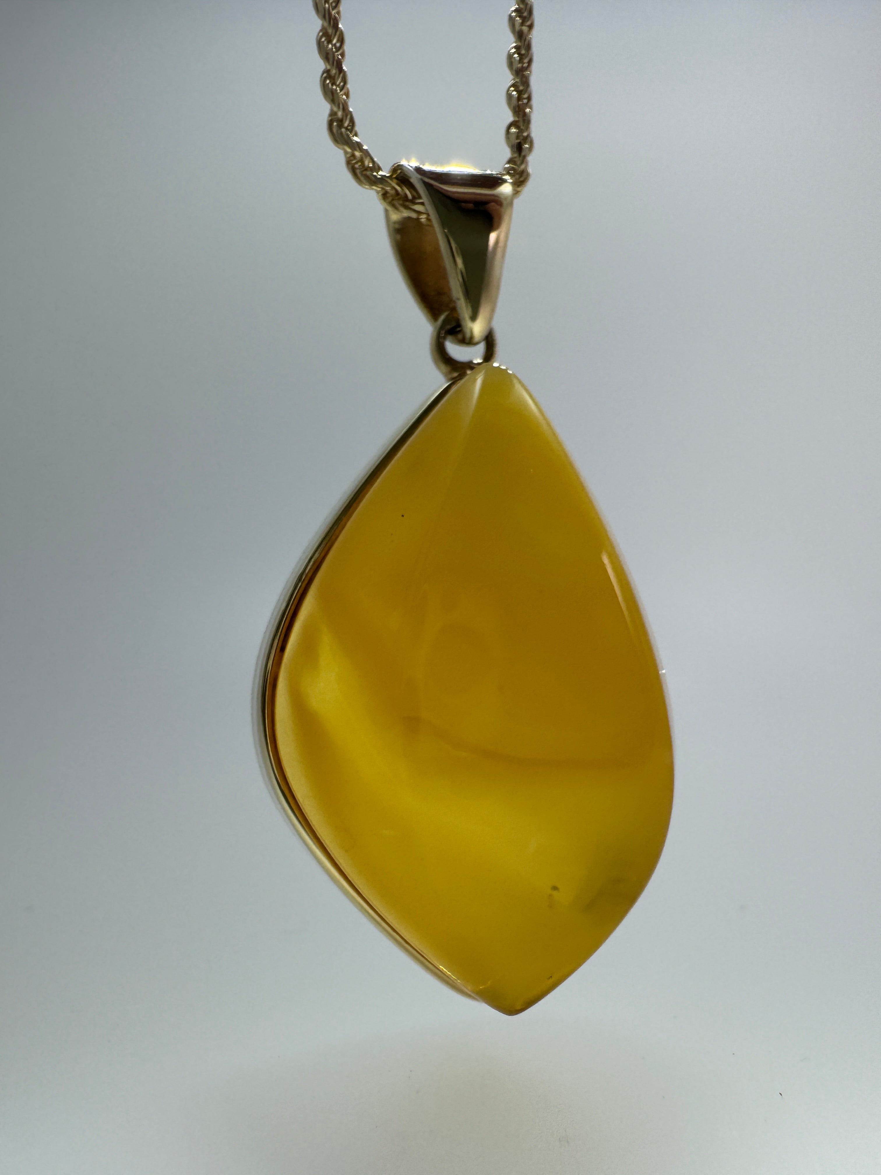 Golden Glow of the Earth | One-of-a-Kind Butterscotch Amber Pendant set in Gold Platted Sterling Silver