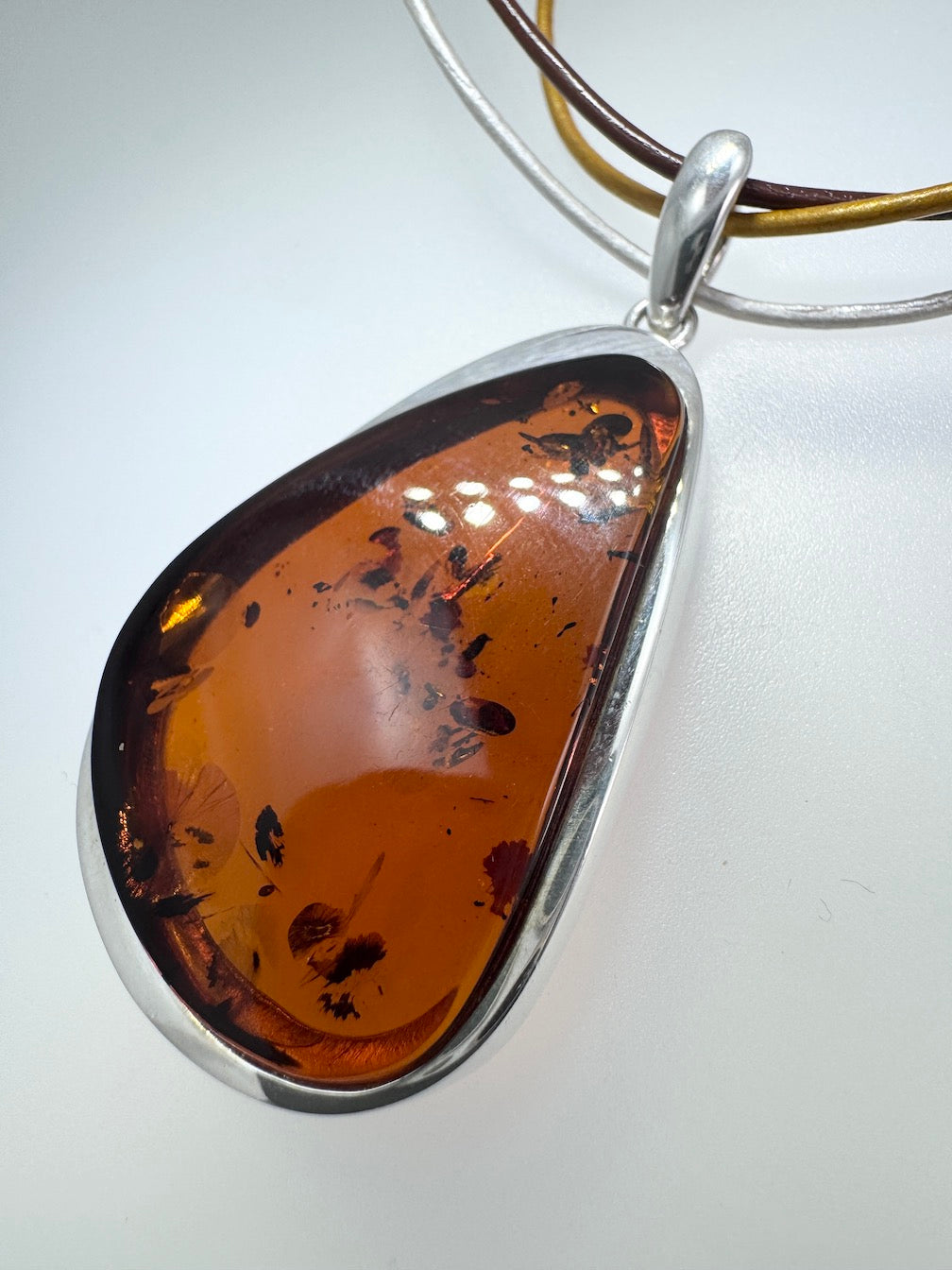 Modern Sterling Silver & Cognac Baltic Amber Pendant Necklace on Multicolor Leather Cord – Handmade in Poland