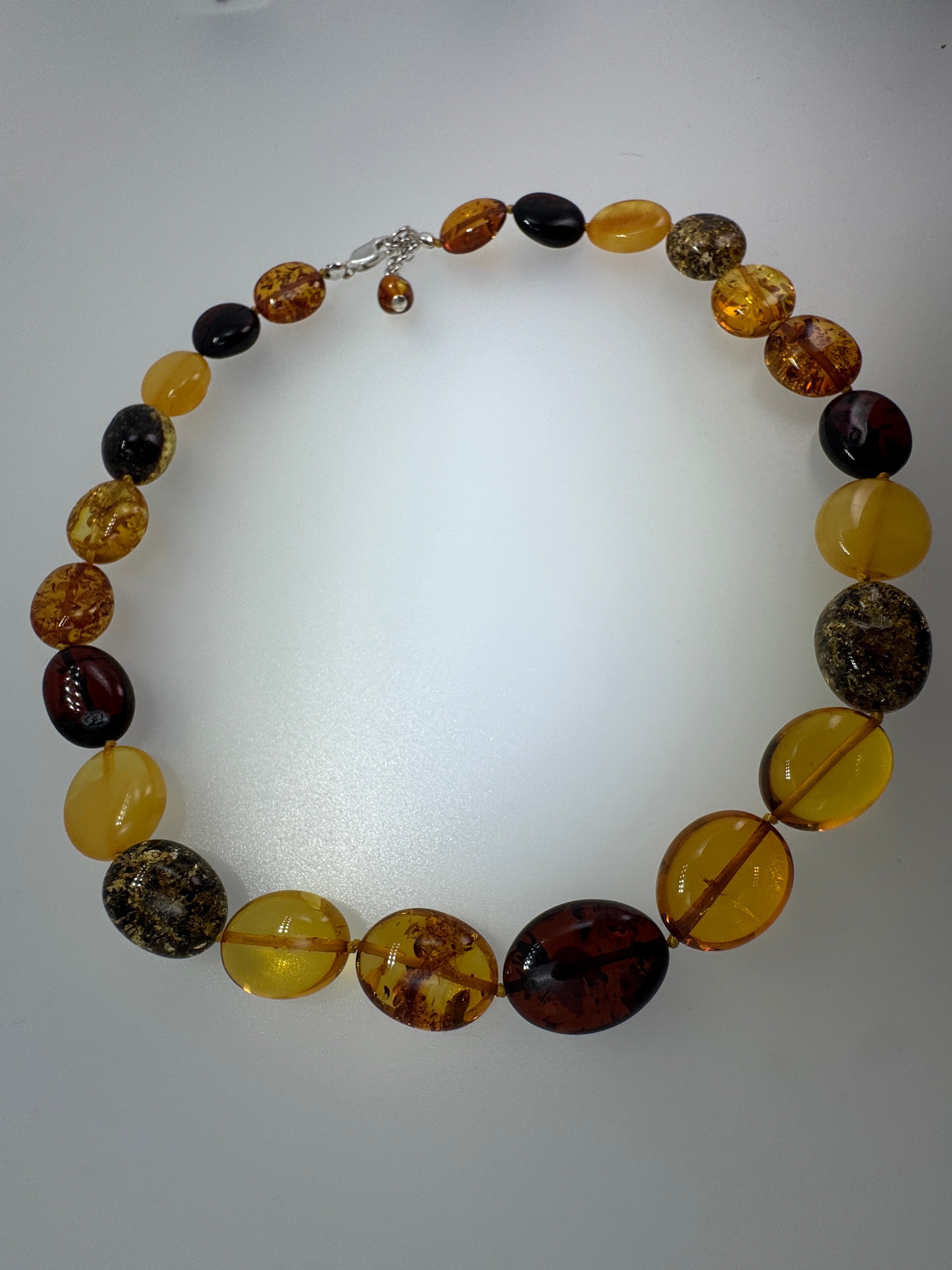 Multicolor Baltic Amber Bead Necklace – Oval Bean Shape, Sterling Silver Closure, Handmade in Lithuania