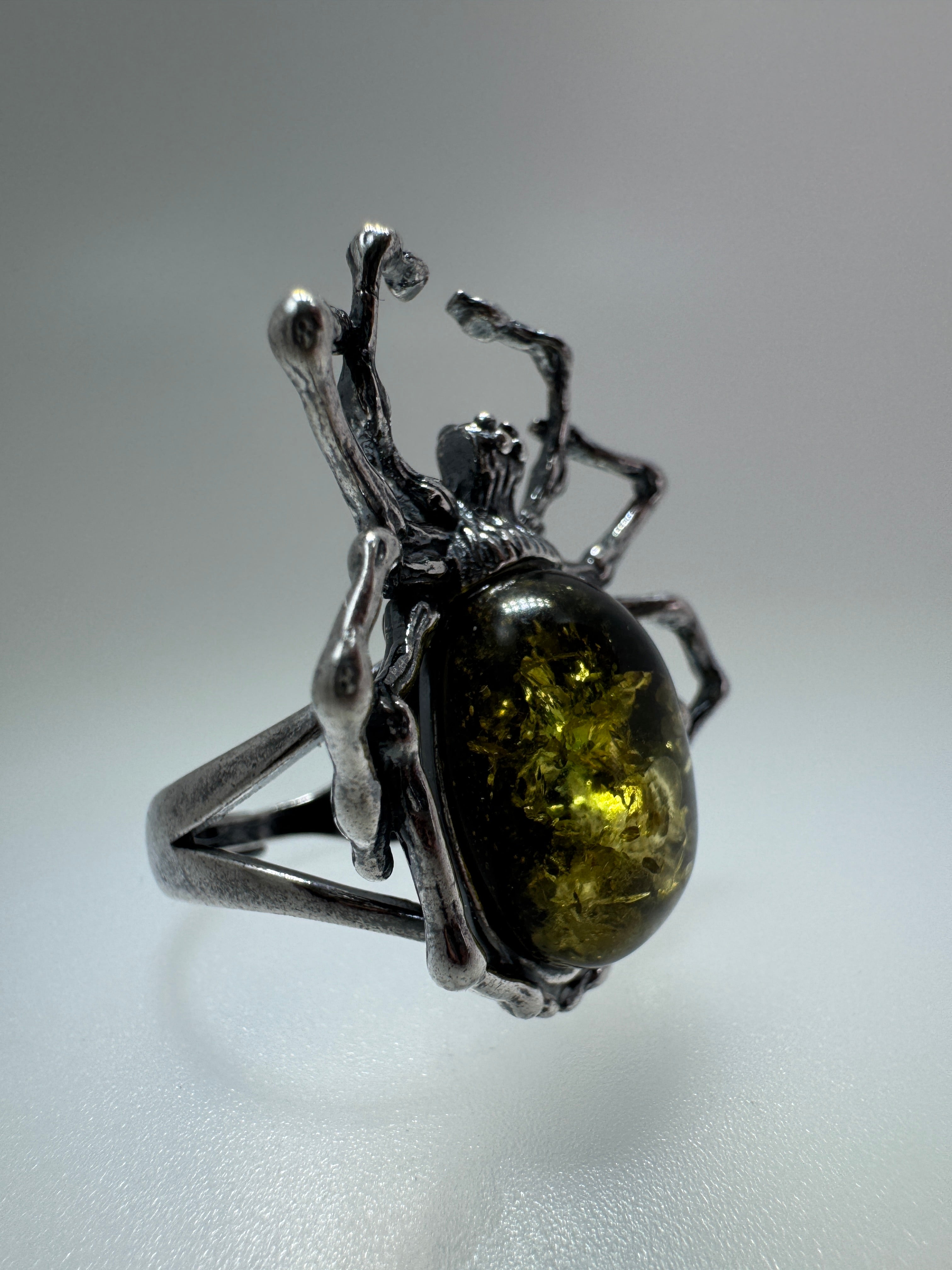 Oxidized Sterling Silver Spider Ring with Green Baltic Amber – Adjustable Open Shank