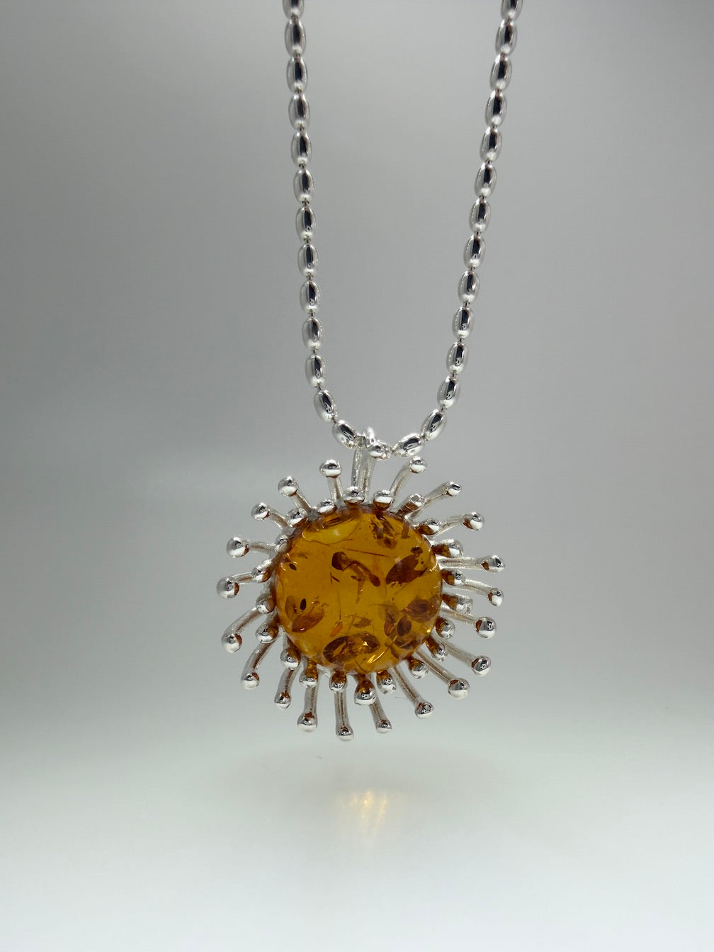 Sterling Silver Cognac Baltic Amber Pendant Necklace – Modern Whimsical Design on Bead Chain – Unique Silver Pin Setting