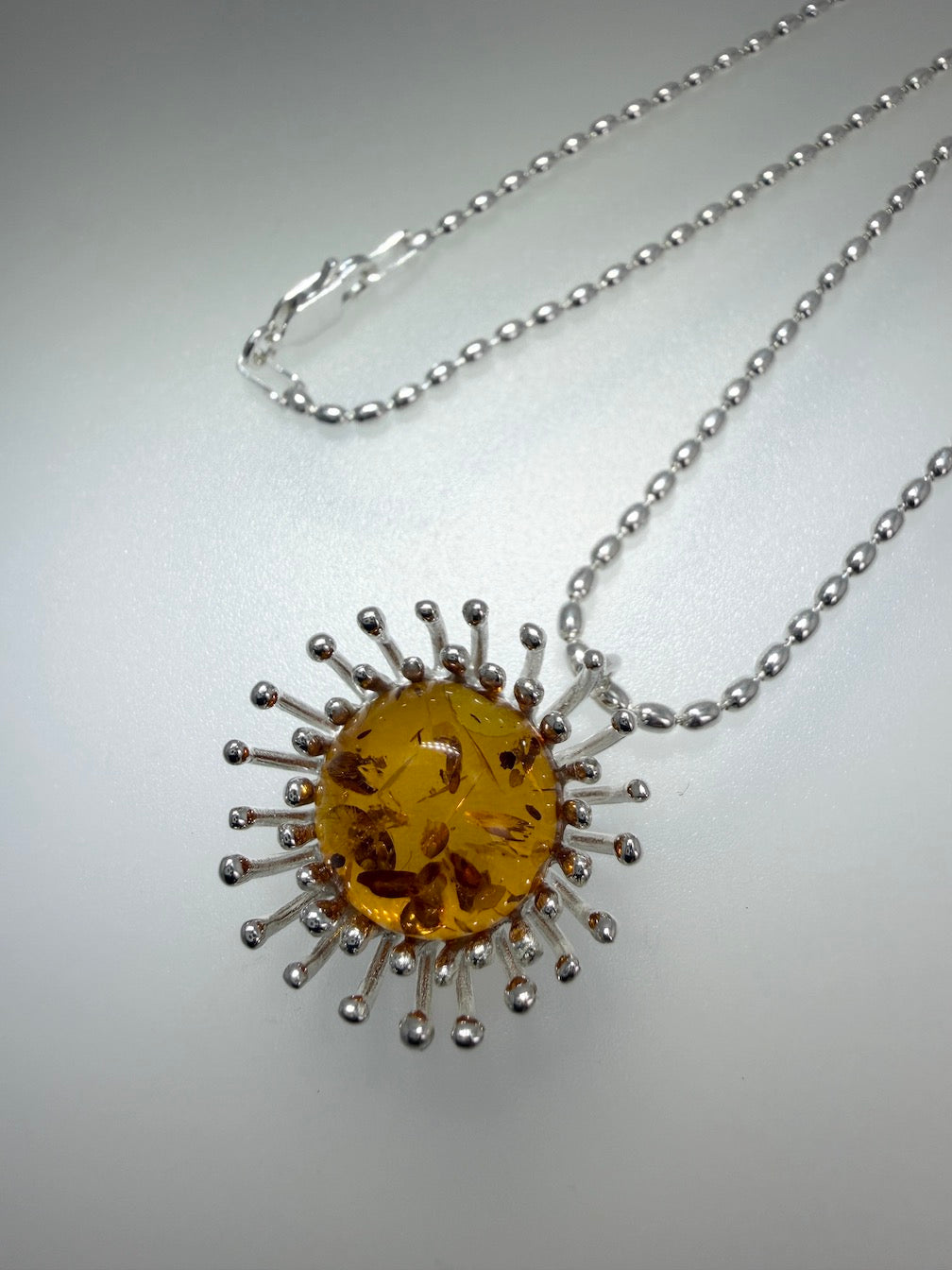 Sterling Silver Cognac Baltic Amber Pendant Necklace – Modern Whimsical Design on Bead Chain – Unique Silver Pin Setting