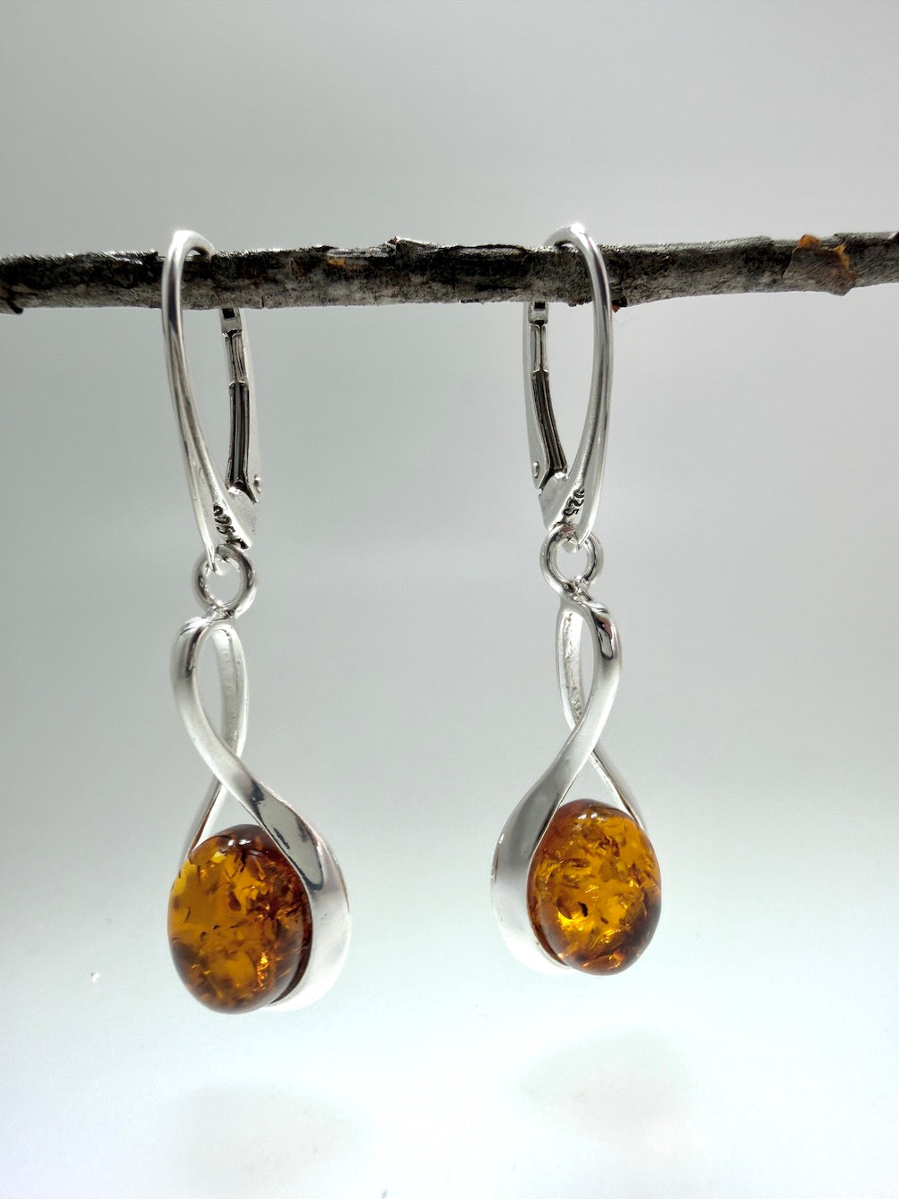 Sterling Silver Cognac Baltic Amber Star & Ribbon Drop Lever Back Earrings | Elegant Lightweight Dangle Jewelry